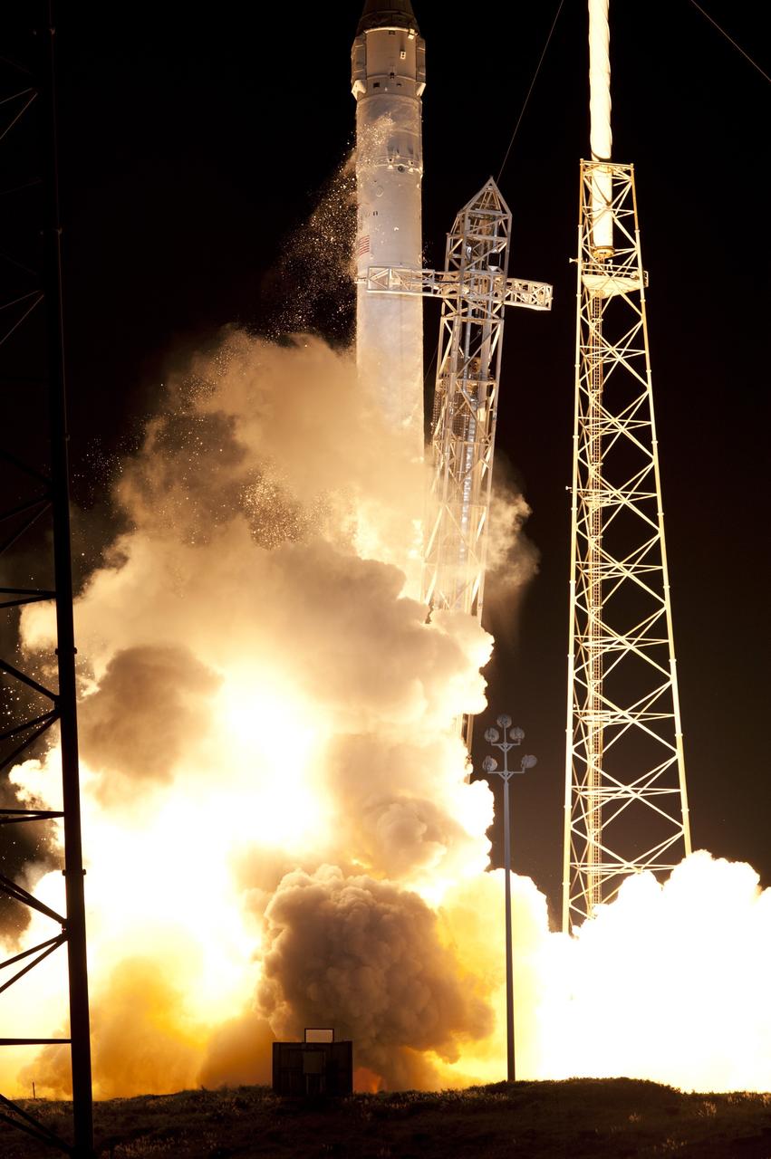 CAPE CANAVERAL, Fla. - Space Launch Complex 40 on Cape Canaveral Air Force Station in Florida comes alive as the Merlin engines ignite under the Falcon 9 rocket carrying a Dragon capsule to orbit. Liftoff was at 8:35 p.m. EDT. Space Exploration Technologies Corp., or SpaceX, built both the rocket and capsule for NASA's first Commercial Resupply Services, or CRS-1, mission to the International Space Station.      SpaceX CRS-1 is an important step toward making America’s microgravity research program self-sufficient by providing a way to deliver and return significant amounts of cargo, including science experiments, to and from the orbiting laboratory. NASA has contracted for 12 commercial resupply flights from SpaceX and eight from the Orbital Sciences Corp. For more information, visit http://www.nasa.gov/mission_pages/station/living/launch/index.html  Photo credit: NASA/ Rick Wetherington and Tim Powers