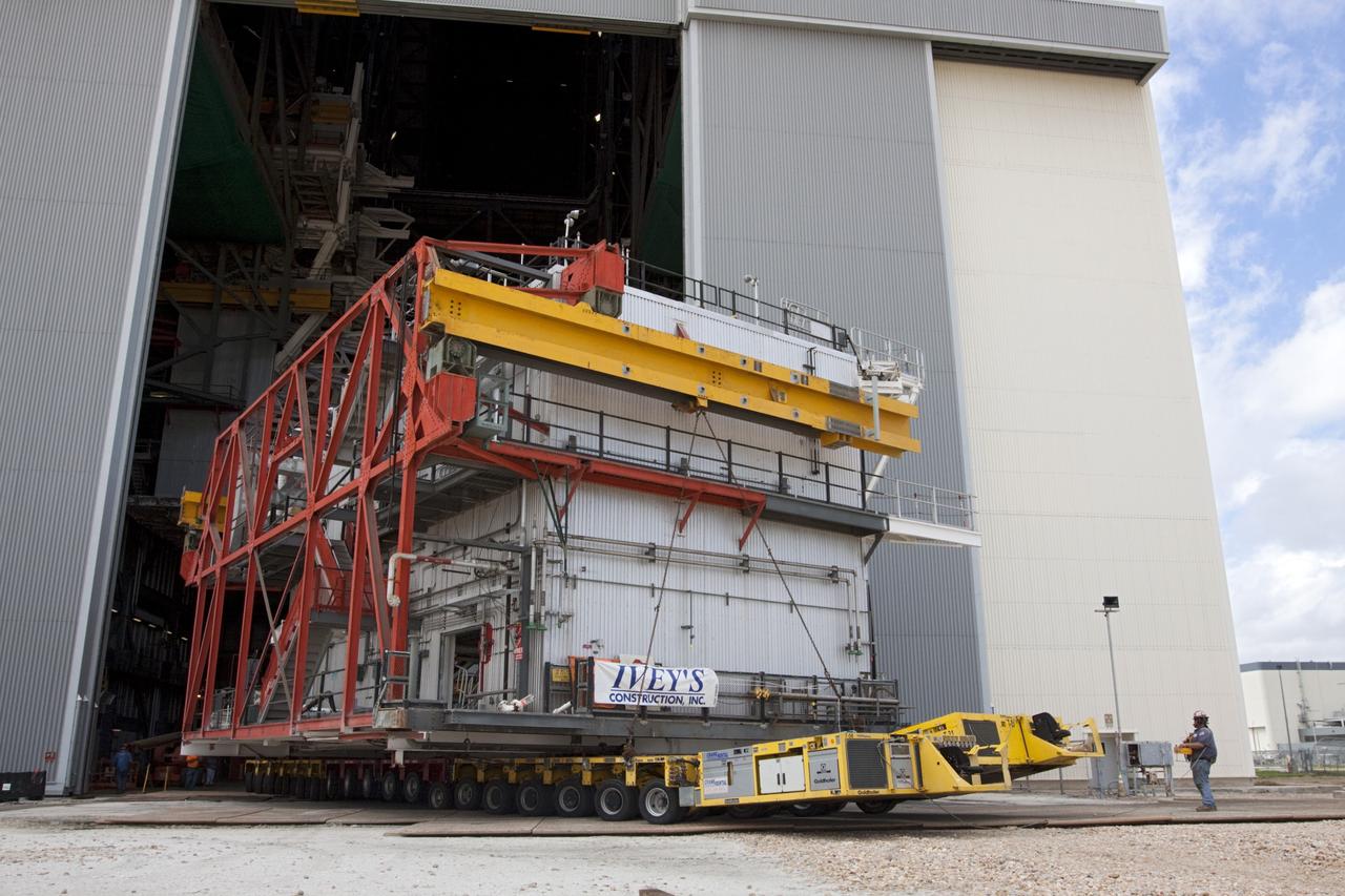 CAPE CANAVERAL, Fla. – As part of NASA's Ground Systems Development and Operations Program at the Kennedy Space Center in Florida, a large space shuttle-era work platform is being removed from high bay 3 of the Vehicle Assembly Building, or VAB. The work is part of a center-wide modernization and refurbishment initiative to accommodate NASA’s Space Launch System and a variety of other spacecraft instead of the whole building supporting one design. The Ground Systems Development and Operations Program is developing the necessary ground systems, infrastructure and operational approaches required to safely process, assemble, transport and launch the next generation of rockets and spacecraft in support of NASA’s exploration objectives. Future work also will replace the antiquated communications, power and vehicle access resources with modern efficient systems. Some of the utilities and systems slated for replacement have been used since the VAB opened in 1965. For more information, visit http://www.nasa.gov/exploration/systems/ground/index.html Photo credit: NASA/Kim Shiflett