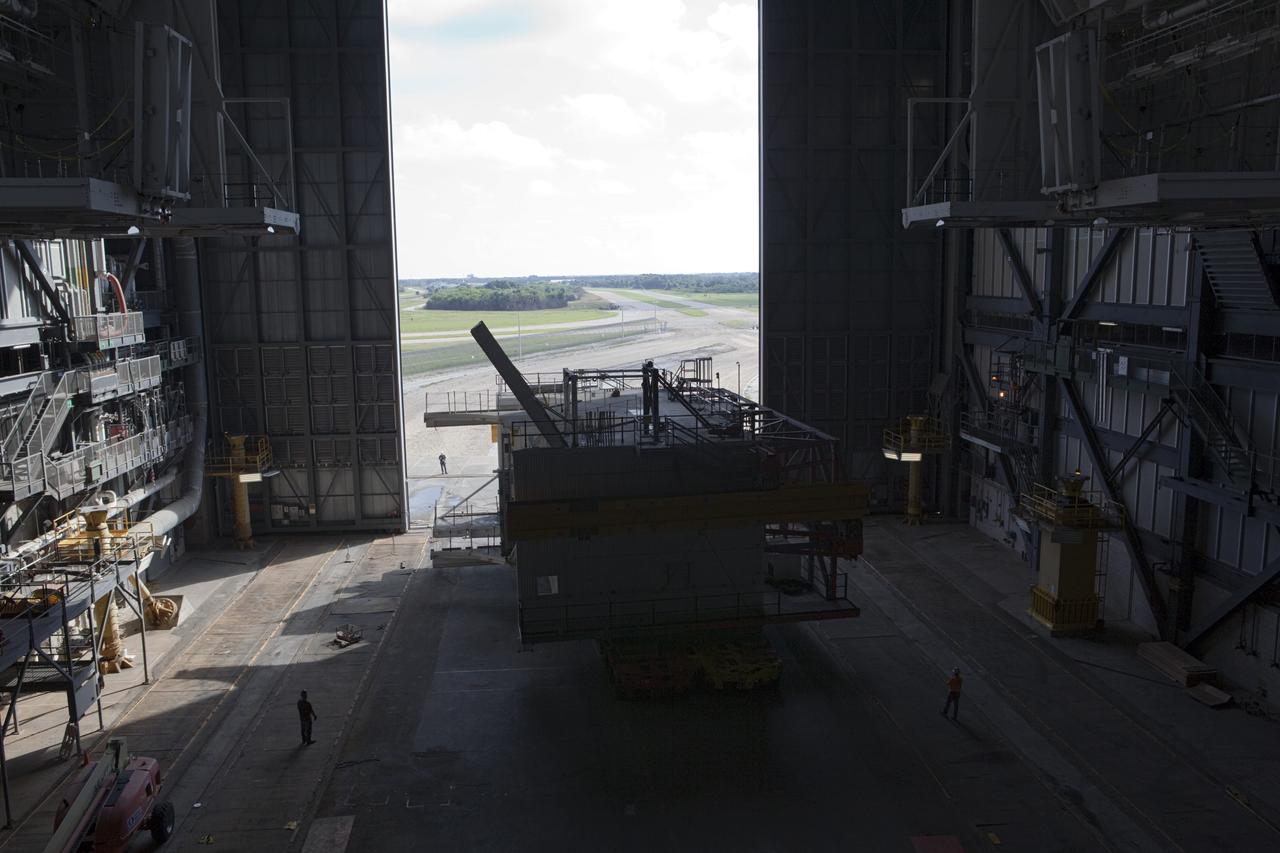 CAPE CANAVERAL, Fla. – As part of NASA's Ground Systems Development and Operations Program at the Kennedy Space Center in Florida, a large space shuttle-era work platform is being removed from high bay 3 of the Vehicle Assembly Building, or VAB. The work is part of a center-wide modernization and refurbishment initiative to accommodate NASA’s Space Launch System and a variety of other spacecraft instead of the whole building supporting one design. The Ground Systems Development and Operations Program is developing the necessary ground systems, infrastructure and operational approaches required to safely process, assemble, transport and launch the next generation of rockets and spacecraft in support of NASA’s exploration objectives. Future work also will replace the antiquated communications, power and vehicle access resources with modern efficient systems. Some of the utilities and systems slated for replacement have been used since the VAB opened in 1965. For more information, visit http://www.nasa.gov/exploration/systems/ground/index.html Photo credit: NASA/Dimitri Gerondidakis