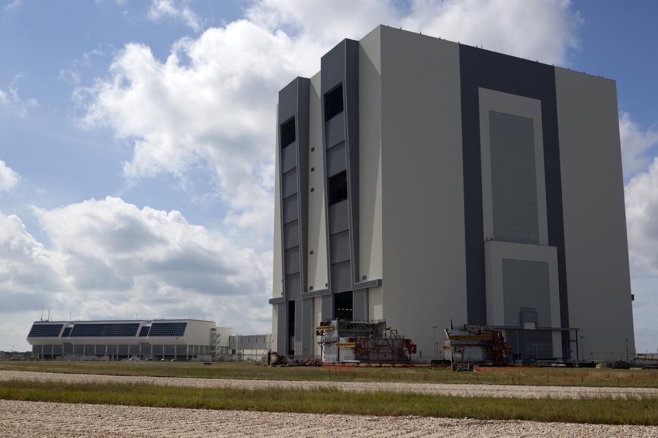 CAPE CANAVERAL, Fla. – As part of NASA's Ground Systems Development and Operations Program at the Kennedy Space Center in Florida, a large space shuttle-era work platform is being removed by transporter from high bay 3 of the Vehicle Assembly Building, or VAB. The work is part of a center-wide modernization and refurbishment initiative to accommodate NASA’s Space Launch System and a variety of other spacecraft instead of the whole building supporting one design. The Ground Systems Development and Operations Program is developing the necessary ground systems, infrastructure and operational approaches required to safely process, assemble, transport and launch the next generation of rockets and spacecraft in support of NASA’s exploration objectives. Future work also will replace the antiquated communications, power and vehicle access resources with modern efficient systems. Some of the utilities and systems slated for replacement have been used since the VAB opened in 1965. For more information, visit http://www.nasa.gov/exploration/systems/ground/index.html Photo credit: NASA/Dimitri Gerondidakis
