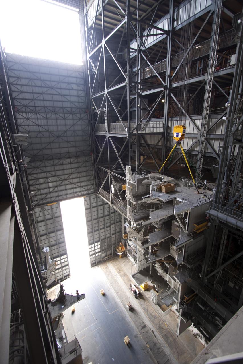 CAPE CANAVERAL, Fla. – As part of NASA's Ground Systems Development and Operations Program at the Kennedy Space Center in Florida, a large space shuttle-era work platform is being removed from high bay 3 of the Vehicle Assembly Building, or VAB. The work is part of a center-wide modernization and refurbishment initiative to accommodate NASA’s Space Launch System and a variety of other spacecraft instead of the whole building supporting one design. The Ground Systems Development and Operations Program is developing the necessary ground systems, infrastructure and operational approaches required to safely process, assemble, transport and launch the next generation of rockets and spacecraft in support of NASA’s exploration objectives. Future work also will replace the antiquated communications, power and vehicle access resources with modern efficient systems. Some of the utilities and systems slated for replacement have been used since the VAB opened in 1965. For more information, visit http://www.nasa.gov/exploration/systems/ground/index.html Photo credit: NASA/Jim Grossmann