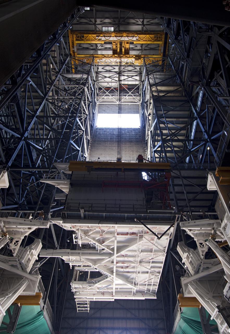 CAPE CANAVERAL, Fla. – As part of NASA's Ground Systems Development and Operations Program at the Kennedy Space Center in Florida, a large space shuttle-era work platform is being removed from high bay 3 of the Vehicle Assembly Building, or VAB. The work is part of a center-wide modernization and refurbishment initiative to accommodate NASA’s Space Launch System and a variety of other spacecraft instead of the whole building supporting one design. The Ground Systems Development and Operations Program is developing the necessary ground systems, infrastructure and operational approaches required to safely process, assemble, transport and launch the next generation of rockets and spacecraft in support of NASA’s exploration objectives. Future work also will replace the antiquated communications, power and vehicle access resources with modern efficient systems. Some of the utilities and systems slated for replacement have been used since the VAB opened in 1965. For more information, visit http://www.nasa.gov/exploration/systems/ground/index.html Photo credit: NASA/Jim Grossmann