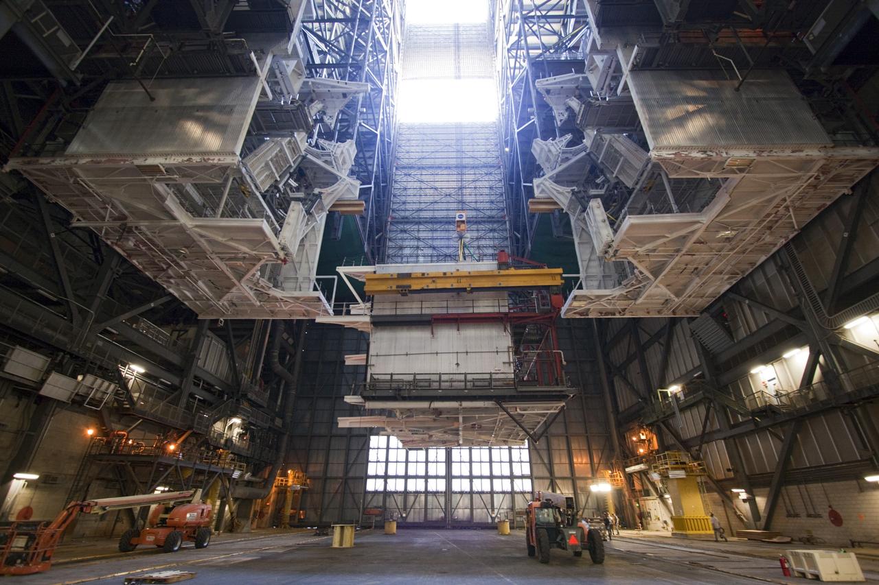 CAPE CANAVERAL, Fla. – As part of NASA's Ground Systems Development and Operations Program at the Kennedy Space Center in Florida, a large space shuttle-era work platform is being removed from high bay 3 of the Vehicle Assembly Building, or VAB. The work is part of a center-wide modernization and refurbishment initiative to accommodate NASA’s Space Launch System and a variety of other spacecraft instead of the whole building supporting one design. The Ground Systems Development and Operations Program is developing the necessary ground systems, infrastructure and operational approaches required to safely process, assemble, transport and launch the next generation of rockets and spacecraft in support of NASA’s exploration objectives. Future work also will replace the antiquated communications, power and vehicle access resources with modern efficient systems. Some of the utilities and systems slated for replacement have been used since the VAB opened in 1965. For more information, visit http://www.nasa.gov/exploration/systems/ground/index.html Photo credit: NASA/Jim Grossmann