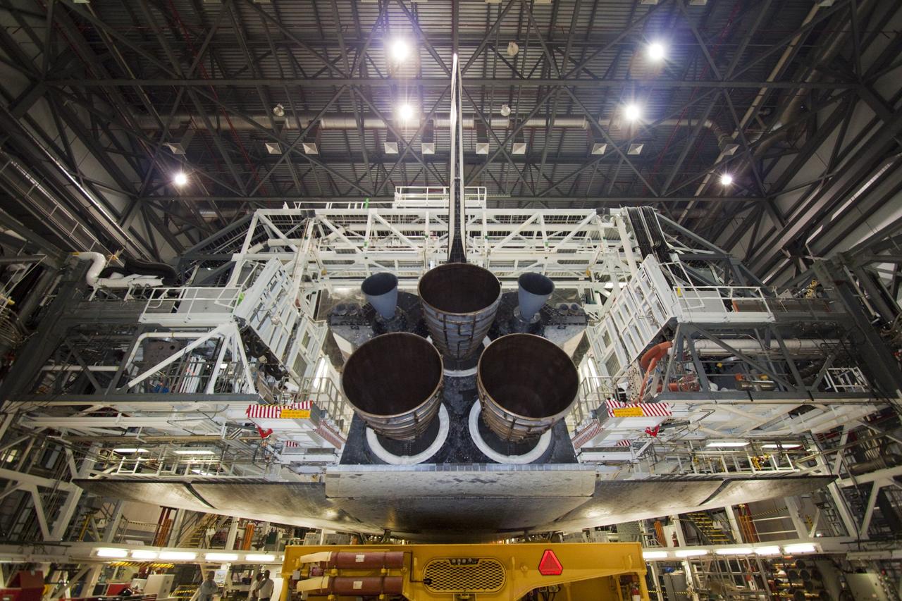 CAPE CANAVERAL, Fla. – Space shuttle Atlantis is loaded onto the orbiter transporter vehicle in Orbiter Processing Facility-2 at NASA's Kennedy Space Center in Florida. The shuttle is being prepared for its move from the OPF to the Vehicle Assembly Building during transition and retirement work. Later, the shuttle will be taken to the Kennedy Space Center Visitor Complex where it will go on public display. Photo credit: NASA/Jim Grossmann