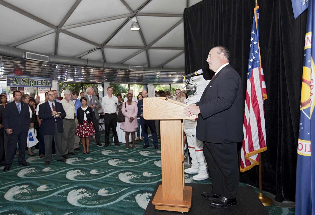 PORT CANAVERAL, Fla. – Greg Weiner, senior director of Business Development for the Economic Development Commission of Florida’s Space Coast, spoke during opening ceremonies at the Historically Underutilized Business Zone, or HUBZone, Industry Day and Expo 2012.      The event was hosted for business leaders who are interested in learning about government contracting opportunities and what local and national vendors have to offer. The expo was held in Cruise Terminal 4 at Port Canaveral, Fla. The annual trade show is sponsored by Kennedy's Prime Contractor Board, the U.S. Air Force 45th Space Wing and the Canaveral Port Authority. It featured about 175 large and small businesses and government exhibitors from Brevard County and across the nation. Photo credit: NASA/ Kim Shiflett