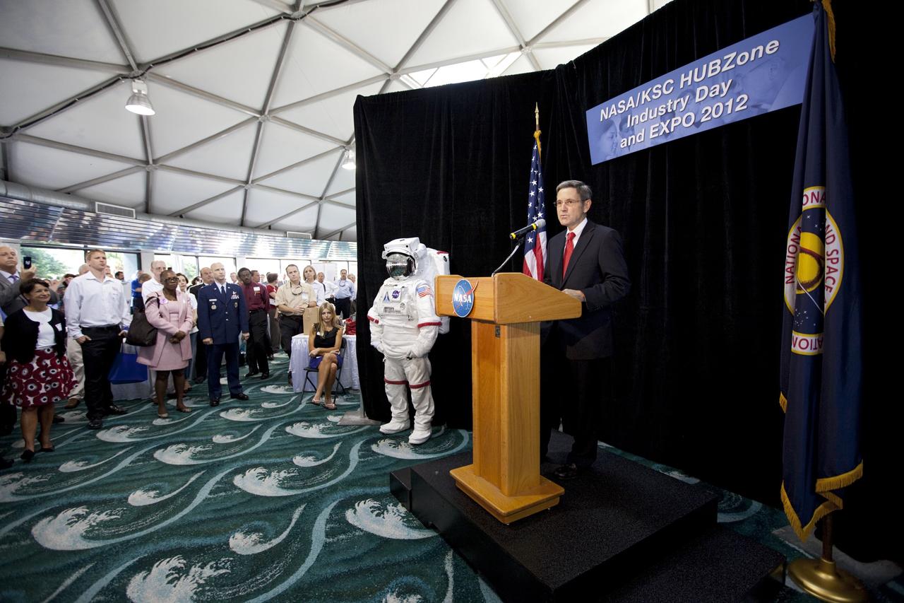 PORT CANAVERAL, Fla. – Bob Cabana, director of the Kennedy Space Center in Florida, spoke during opening ceremonies at the Historically Underutilized Business Zone, or HUBZone, Industry Day and Expo 2012.      The event was hosted for business leaders who are interested in learning about government contracting opportunities and what local and national vendors have to offer. The expo was held in Cruise Terminal 4 at Port Canaveral, Fla. The annual trade show is sponsored by Kennedy's Prime Contractor Board, the U.S. Air Force 45th Space Wing and the Canaveral Port Authority. It featured about 175 large and small businesses and government exhibitors from Brevard County and across the nation. Photo credit: NASA/ Kim Shiflett