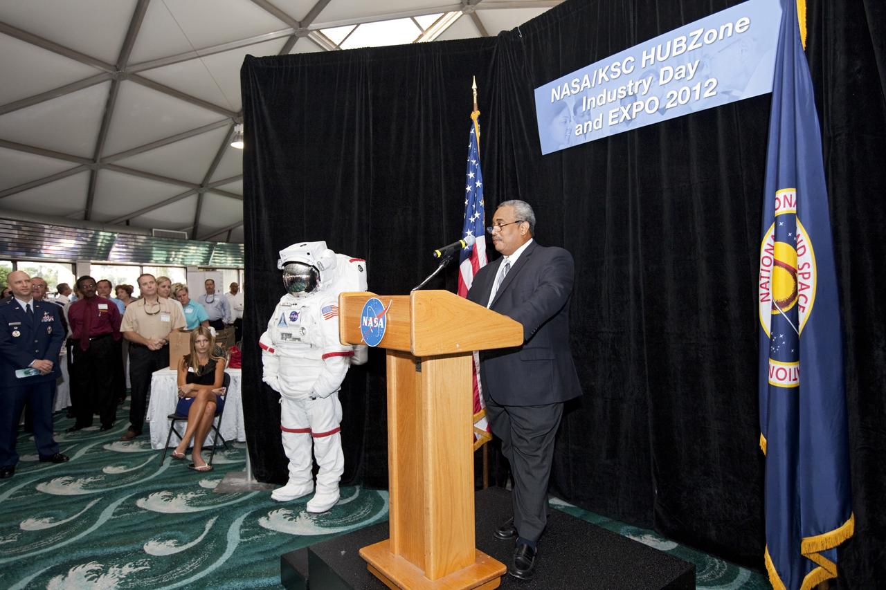 PORT CANAVERAL, Fla. – Glenn Delgado, NASA associate administrator for the Office of Small Business Programs, spoke during opening ceremonies at the Historically Underutilized Business Zone, or HUBZone, Industry Day and Expo 2012.      The event was hosted for business leaders who are interested in learning about government contracting opportunities and what local and national vendors have to offer. The expo was held in Cruise Terminal 4 at Port Canaveral, Fla. The annual trade show is sponsored by Kennedy's Prime Contractor Board, the U.S. Air Force 45th Space Wing and the Canaveral Port Authority. It featured about 175 large and small businesses and government exhibitors from Brevard County and across the nation. Photo credit: NASA/ Kim Shiflett
