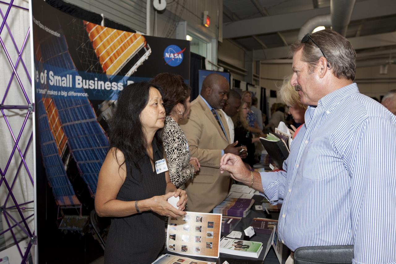 PORT CANAVERAL, Fla. – Local business representatives attended NASA's Historically Underutilized Business Zone, or HUBZone, Industry Day and Expo 2012 on Oct. 16. Exhibitors included vendors from product and service areas, such as engineering services, computer technology, communication equipment and services, and construction and safety products.      The event was hosted for business leaders who are interested in learning about government contracting opportunities and what local and national vendors have to offer. The expo was held in Cruise Terminal 4 at Port Canaveral, Fla. The annual trade show is sponsored by Kennedy's Prime Contractor Board, the U.S. Air Force 45th Space Wing and the Canaveral Port Authority. It featured about 175 large and small businesses and government exhibitors from Brevard County and across the nation. Photo credit: NASA/ Kim Shiflett