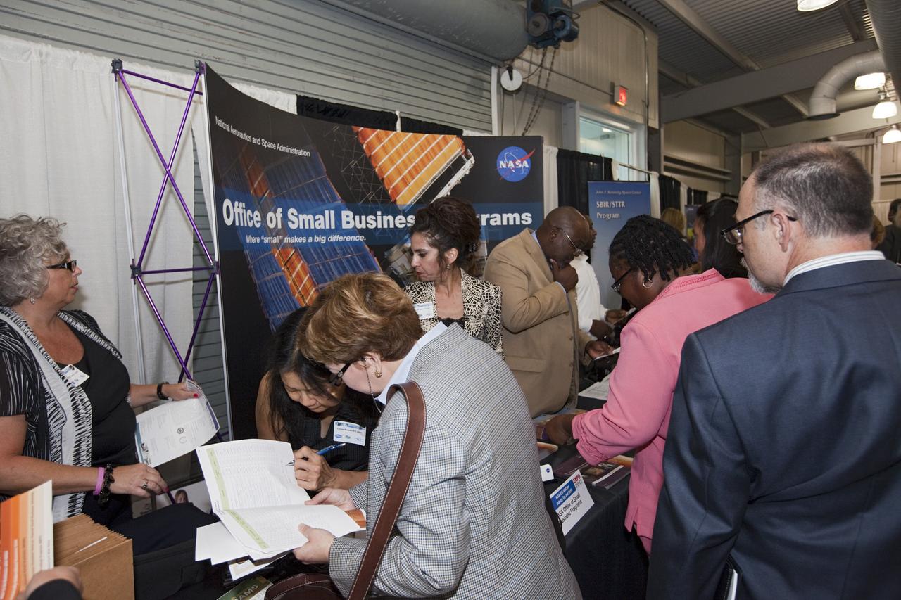 PORT CANAVERAL, Fla. – Local business representatives attended NASA's Historically Underutilized Business Zone, or HUBZone, Industry Day and Expo 2012 on Oct. 16. Exhibitors included vendors from product and service areas, such as engineering services, computer technology, communication equipment and services, and construction and safety products.      The event was hosted for business leaders who are interested in learning about government contracting opportunities and what local and national vendors have to offer. The expo was held in Cruise Terminal 4 at Port Canaveral, Fla. The annual trade show is sponsored by Kennedy's Prime Contractor Board, the U.S. Air Force 45th Space Wing and the Canaveral Port Authority. It featured about 175 large and small businesses and government exhibitors from Brevard County and across the nation. Photo credit: NASA/ Kim Shiflett