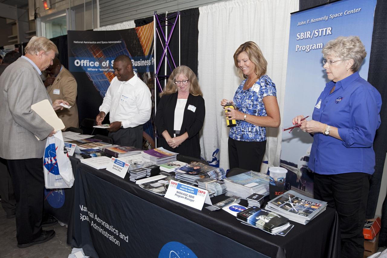 PORT CANAVERAL, Fla. – Local business representatives attended NASA's Historically Underutilized Business Zone, or HUBZone, Industry Day and Expo 2012 on Oct. 16. Exhibitors included vendors from product and service areas, such as engineering services, computer technology, communication equipment and services, and construction and safety products.      The event was hosted for business leaders who are interested in learning about government contracting opportunities and what local and national vendors have to offer. The expo was held in Cruise Terminal 4 at Port Canaveral, Fla. The annual trade show is sponsored by Kennedy's Prime Contractor Board, the U.S. Air Force 45th Space Wing and the Canaveral Port Authority. It featured about 175 large and small businesses and government exhibitors from Brevard County and across the nation. Photo credit: NASA/ Kim Shiflett
