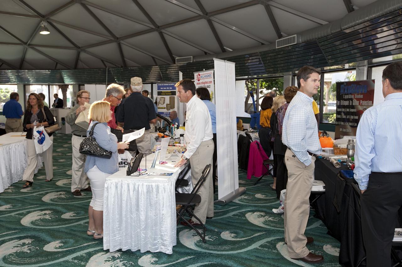 PORT CANAVERAL, Fla. – Local business representatives attended NASA's Historically Underutilized Business Zone, or HUBZone, Industry Day and Expo 2012 on Oct. 16. Exhibitors included vendors from product and service areas, such as engineering services, computer technology, communication equipment and services, and construction and safety products. The event was hosted for business leaders who are interested in learning about government contracting opportunities and what local and national vendors have to offer. The expo was held in Cruise Terminal 4 at Port Canaveral, Fla. The annual trade show is sponsored by Kennedy's Prime Contractor Board, the U.S. Air Force 45th Space Wing and the Canaveral Port Authority. It featured about 175 large and small businesses and government exhibitors from Brevard County and across the nation. Photo credit: NASA/ Kim Shiflett