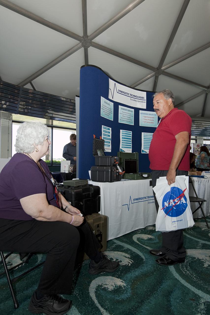 PORT CANAVERAL, Fla. – Local business representatives attended NASA's Historically Underutilized Business Zone, or HUBZone, Industry Day and Expo 2012 on Oct. 16. Exhibitors included vendors from product and service areas, such as engineering services, computer technology, communication equipment and services, and construction and safety products.      The event was hosted for business leaders who are interested in learning about government contracting opportunities and what local and national vendors have to offer. The expo was held in Cruise Terminal 4 at Port Canaveral, Fla. The annual trade show is sponsored by Kennedy's Prime Contractor Board, the U.S. Air Force 45th Space Wing and the Canaveral Port Authority. It featured about 175 large and small businesses and government exhibitors from Brevard County and across the nation. Photo credit: NASA/ Kim Shiflett