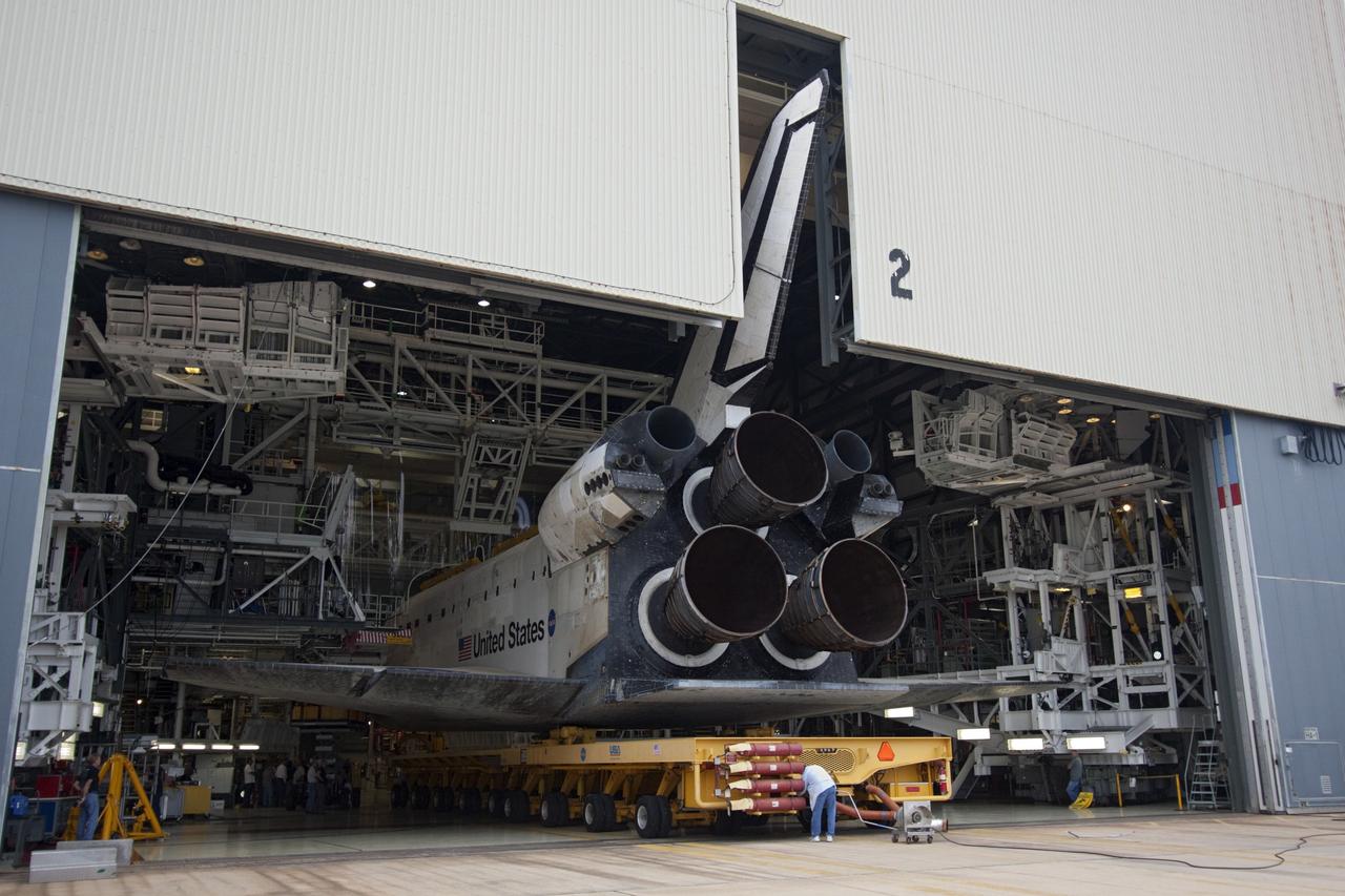 CAPE CANAVERAL, Fla. – A technician works with the orbiter transporter vehicle as space shuttle Atlantis moves from Orbiter Processing Facility-2 to the Vehicle Assembly Building at NASA's Kennedy Space Center in Florida. Atlantis will be moved to the Kennedy Space Center Visitor Complex in November where it will be put on public display. Photo credit: NASA/Jim Grossmann