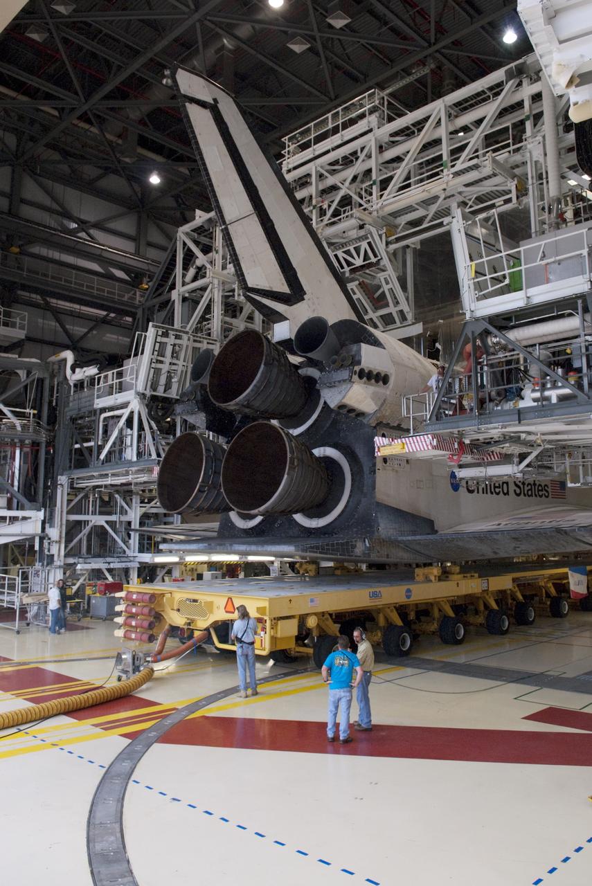 CAPE CANAVERAL, Fla. -- Technicians watch as space shuttle Atlantis moves from Orbiter Processing Facility-2 to the Vehicle Assembly Building at NASA's Kennedy Space Center in Florida. Atlantis will be moved to the Kennedy Space Center Visitor Complex in November where it will be put on public display. Photo credit: NASA/Tim Jacobs