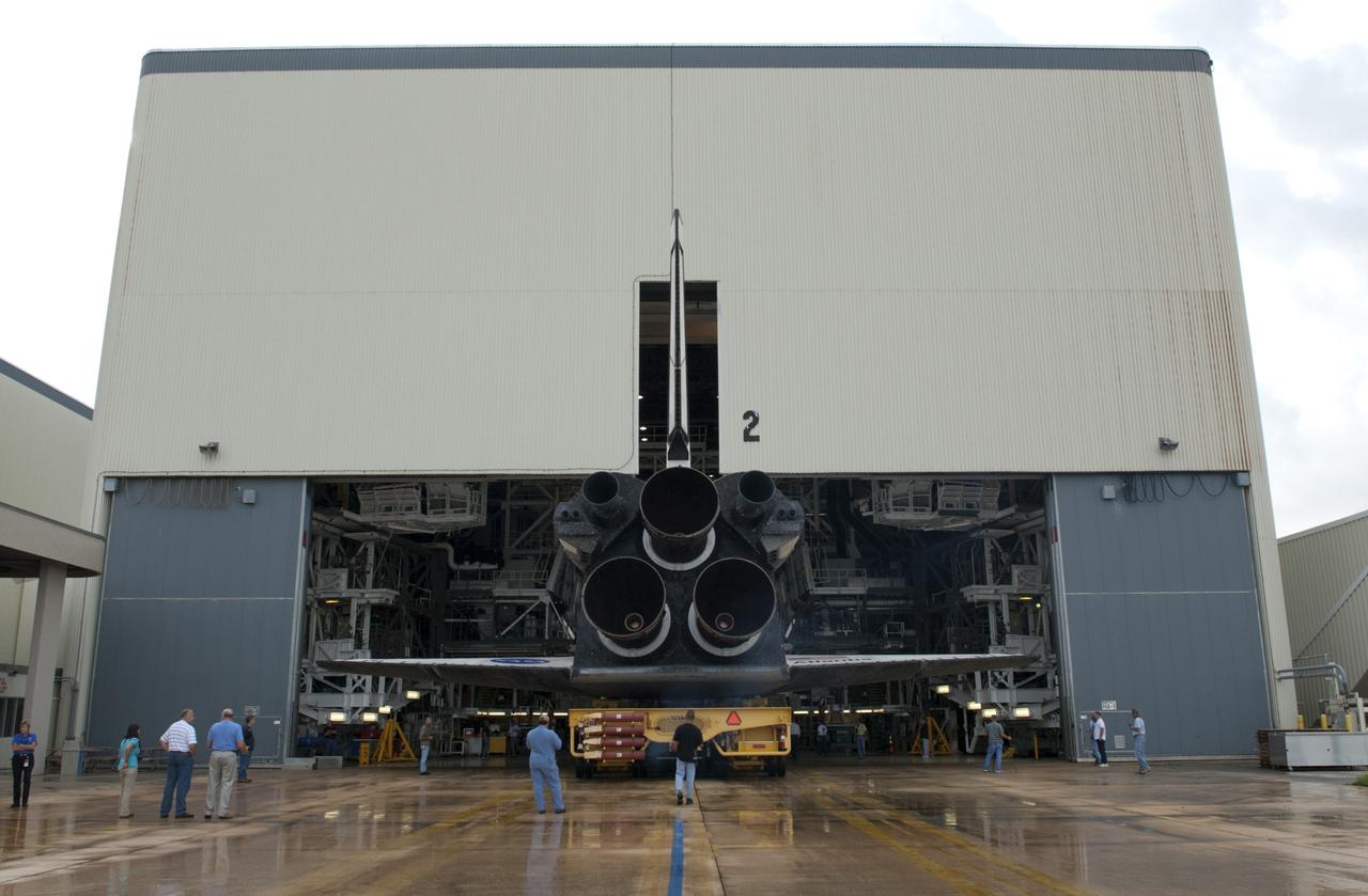 CAPE CANAVERAL, Fla. -- Technicians watch as space shuttle Atlantis moves from Orbiter Processing Facility-2 to the Vehicle Assembly Building at NASA's Kennedy Space Center in Florida. Atlantis will be moved to the Kennedy Space Center Visitor Complex in November where it will be put on public display. Photo credit: NASA/Tim Jacobs