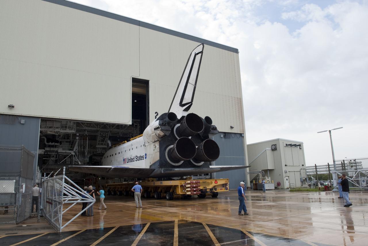 CAPE CANAVERAL, Fla. -- Technicians watch as space shuttle Atlantis moves from Orbiter Processing Facility-2 to the Vehicle Assembly Building at NASA's Kennedy Space Center in Florida. Atlantis will be moved to the Kennedy Space Center Visitor Complex in November where it will be put on public display. Photo credit: NASA/Tim Jacobs
