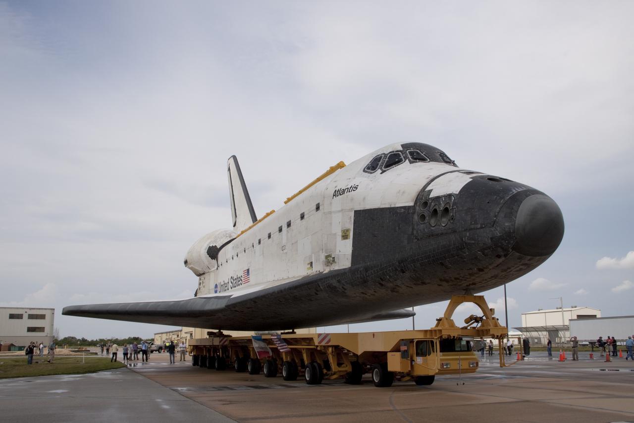 CAPE CANAVERAL, Fla. – Space shuttle Atlantis moves from Orbiter Processing Facility-2 to the Vehicle Assembly Building at NASA's Kennedy Space Center in Florida. Atlantis will be moved to the Kennedy Space Center Visitor Complex in November where it will be placed on public display. Photo credit: NASA/Jim Grossmann