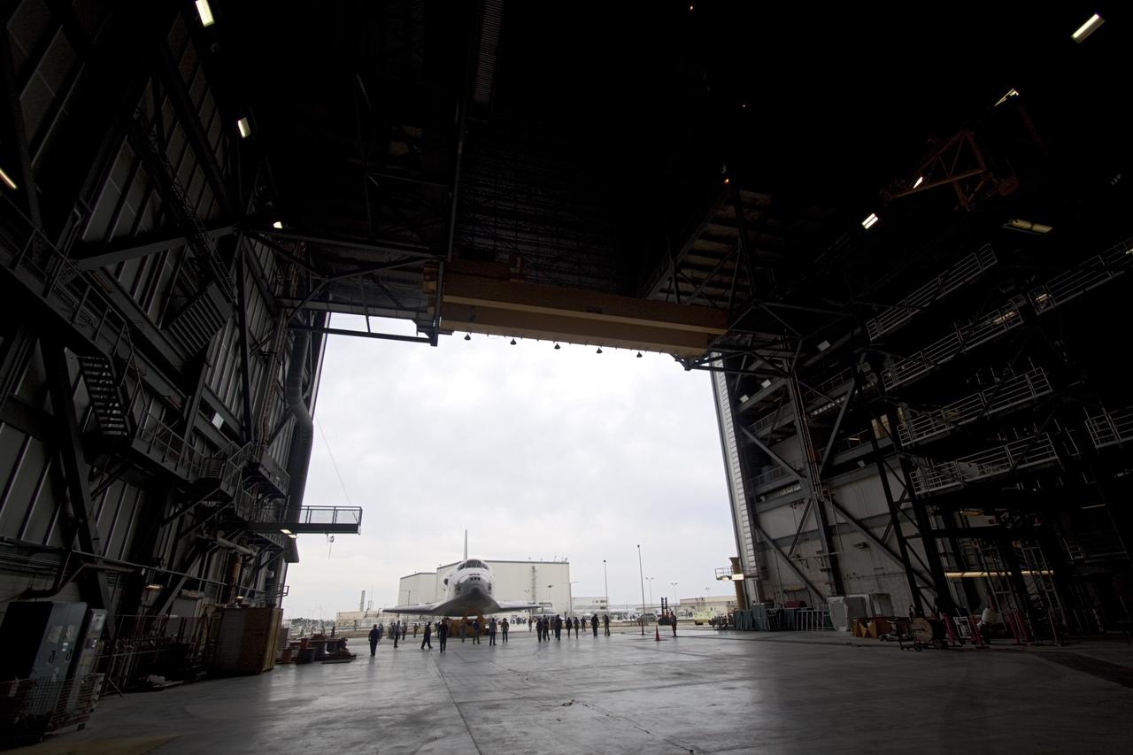 CAPE CANAVERAL, Fla. – Space shuttle Atlantis moves into the Vehicle Assembly Building from Orbiter Processing Facility-2 at NASA's Kennedy Space Center in Florida. Atlantis will be moved to the Kennedy Space Center Visitor Complex in November where it will be placed t on public display. Photo credit: NASA/Jim Grossmann