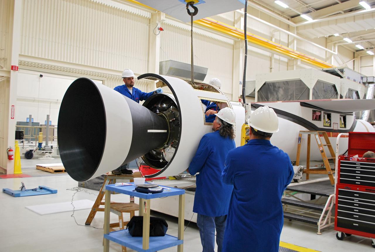 VANDENBERG AIR FORCE BASE, Calif. – At Vandenberg Air Force Base in California, technicians install the aft skirt on the Orbital Sciences Corp. Pegasus XL rocket which will launch the Interface Region Imaging Spectrograph, or IRIS, spacecraft.      Scheduled for launch from Vandenberg Air Force Base no earlier than Feb. 27, 2013, IRIS will open a new window of discovery by tracing the flow of energy and plasma through the chromospheres and transition region into the sun’s corona using spectrometry and imaging. IRIS fills a crucial gap in our ability to advance studies of the sun-to-Earth connection by tracing the flow of energy and plasma through the foundation of the corona and the region around the sun known as the heliosphere. For more information, visit http://iris.gsfc.nasa.gov Photo credit: NASA/Randy Beaudoin