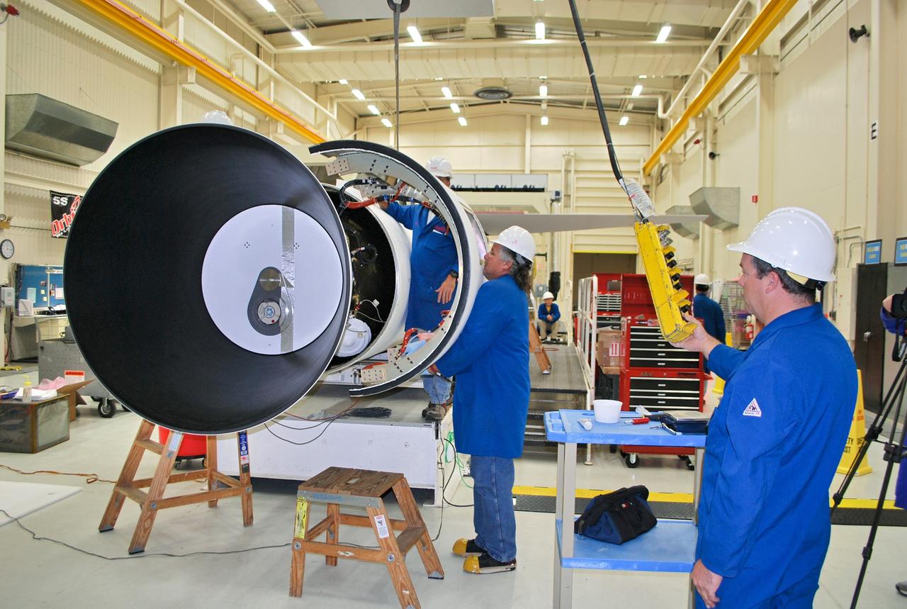VANDENBERG AIR FORCE BASE, Calif. – At Vandenberg Air Force Base in California, technicians install the aft skirt on the Orbital Sciences Corp. Pegasus XL rocket which will launch the Interface Region Imaging Spectrograph, or IRIS, spacecraft.      Scheduled for launch from Vandenberg Air Force Base no earlier than Feb. 27, 2013, IRIS will open a new window of discovery by tracing the flow of energy and plasma through the chromospheres and transition region into the sun’s corona using spectrometry and imaging. IRIS fills a crucial gap in our ability to advance studies of the sun-to-Earth connection by tracing the flow of energy and plasma through the foundation of the corona and the region around the sun known as the heliosphere. For more information, visit http://iris.gsfc.nasa.gov Photo credit: NASA/Randy Beaudoin