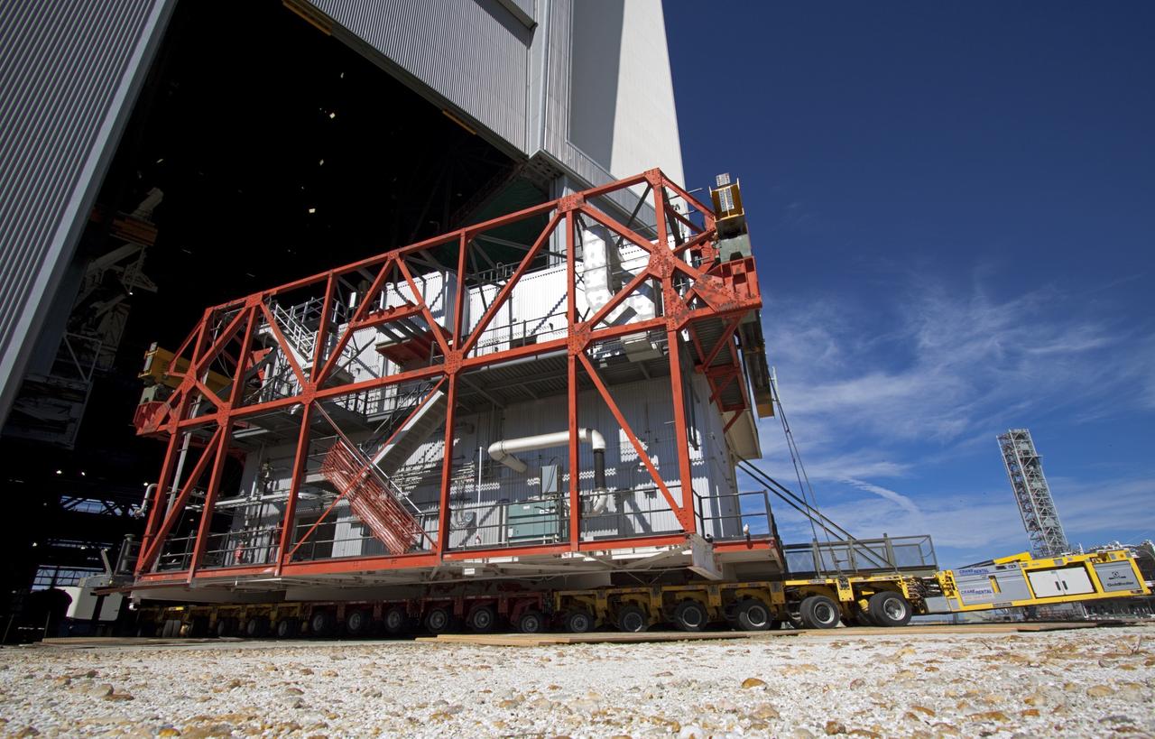 CAPE CANAVERAL, Fla. – As part of NASA's Ground Systems Development and Operations Program at the Kennedy Space Center in Florida, a large space shuttle-era work platform is being removed from high bay 3 of the Vehicle Assembly Building, or VAB. The work is part of a center-wide modernization and refurbishment initiative to accommodate NASA’s Space Launch System and a variety of other spacecraft instead of the whole building supporting one design. The Ground Systems Development and Operations Program is developing the necessary ground systems, infrastructure and operational approaches required to safely process, assemble, transport and launch the next generation of rockets and spacecraft in support of NASA’s exploration objectives. Future work also will replace the antiquated communications, power and vehicle access resources with modern efficient systems. Some of the utilities and systems slated for replacement have been used since the VAB opened in 1965. For more information, visit http://www.nasa.gov/exploration/systems/ground/index.html Photo credit: NASA/Jim Grossmann