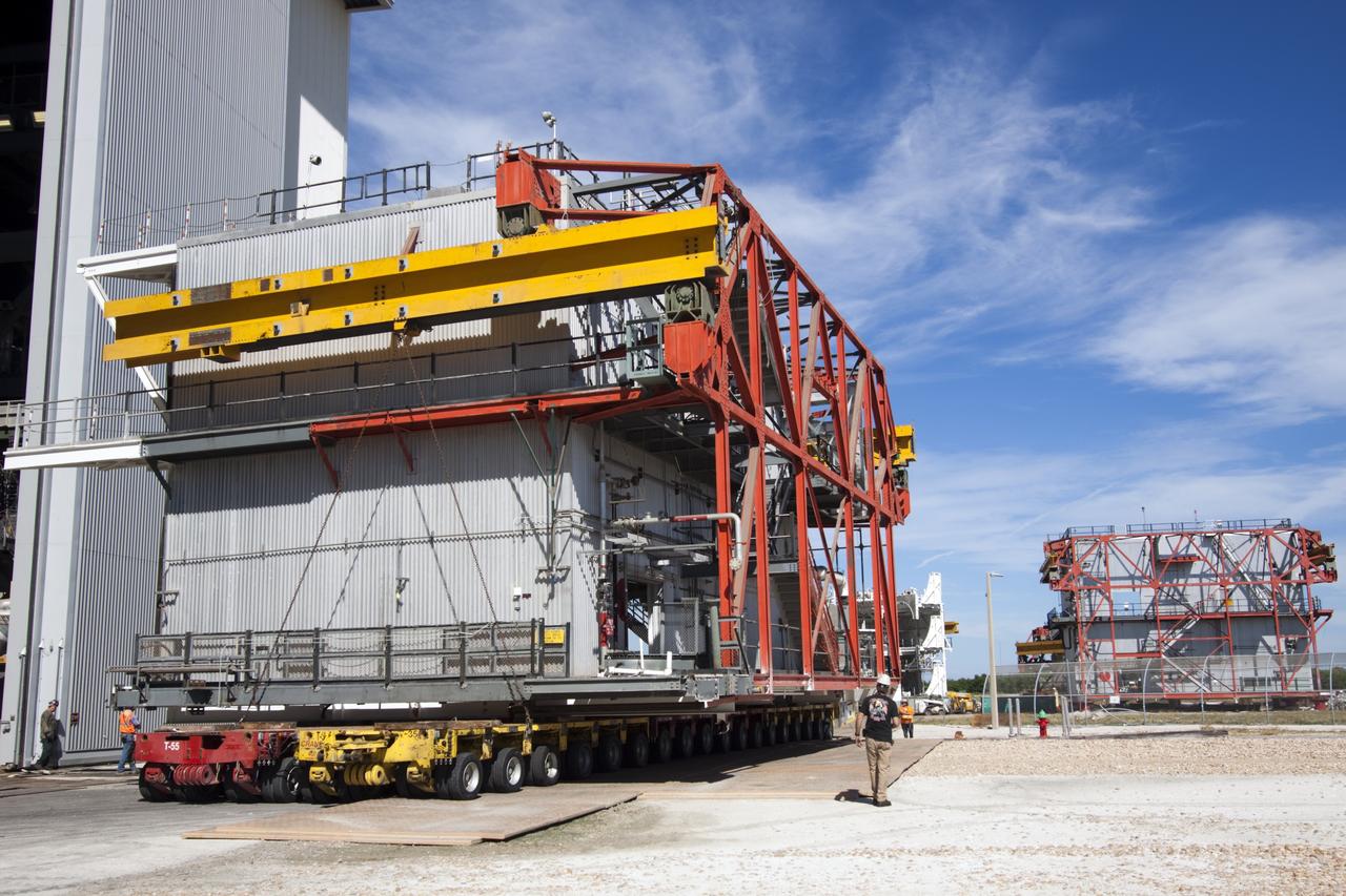 CAPE CANAVERAL, Fla. – As part of NASA's Ground Systems Development and Operations Program at the Kennedy Space Center in Florida, a large space shuttle-era work platform is being removed from high bay 3 of the Vehicle Assembly Building, or VAB. The work is part of a center-wide modernization and refurbishment initiative to accommodate NASA’s Space Launch System and a variety of other spacecraft instead of the whole building supporting one design. The Ground Systems Development and Operations Program is developing the necessary ground systems, infrastructure and operational approaches required to safely process, assemble, transport and launch the next generation of rockets and spacecraft in support of NASA’s exploration objectives. Future work also will replace the antiquated communications, power and vehicle access resources with modern efficient systems. Some of the utilities and systems slated for replacement have been used since the VAB opened in 1965. For more information, visit http://www.nasa.gov/exploration/systems/ground/index.html Photo credit: NASA/Jim Grossmann
