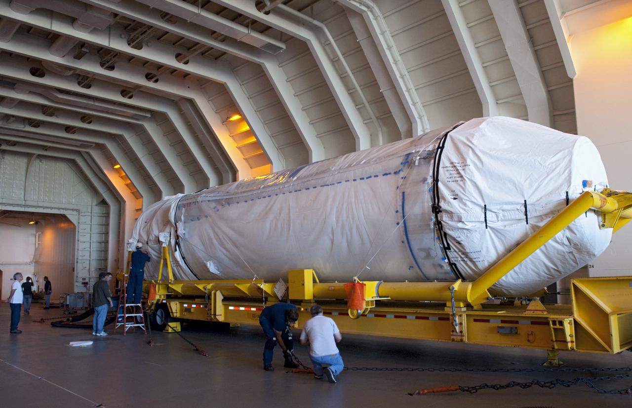 PORT CANAVERAL, Fla. – A Centaur stage is off loaded from the United Launch Alliance barge Delta Mariner that just arrived at Port Canaveral, Fla. The Centaur will be part of a launch vehicle that will boost the Tracking and Data Relay Satellite-K, or TDRS-K, into Earth orbit atop an Atlas V rocket. The Centaur will be transported to the Atlas Spaceflight Operations Center, or ASOC, at Cape Canaveral Air Force Station to begin processing.       The TDRS-K spacecraft is part of the next-generation series in the Tracking and Data Relay Satellite System, a constellation of space-based communication satellites providing tracking, telemetry, command and high-bandwidth data return services. For more information, visit http://tdrs.gsfc.nasa.gov/ Photo credit: NASA/Charisse Nahser