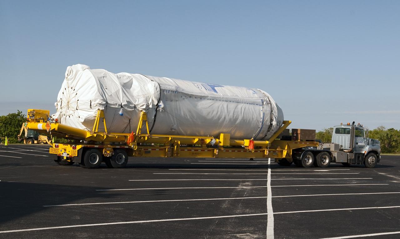 CAPE CANAVERAL, Fla. – A Centaur stage arrives the Atlas Spaceflight Operations Center, or ASOC, at Cape Canaveral Air Force Station to begin processing. The Centaur will be part of a launch vehicle that will boost the Tracking and Data Relay Satellite-K, or TDRS-K, into Earth orbit atop an Atlas V rocket. Lift off is scheduled for 11:57 p.m. on Dec. 13, 2012 from Space Launch Complex 41 at Cape Canaveral.      The TDRS-K spacecraft is part of the next-generation series in the Tracking and Data Relay Satellite System, a constellation of space-based communication satellites providing tracking, telemetry, command and high-bandwidth data return services. For more information, visit http://tdrs.gsfc.nasa.gov/ Photo credit: NASA/Charisse Nahser