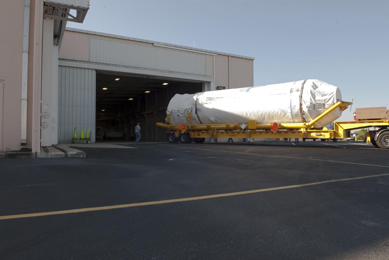 CAPE CANAVERAL, Fla. – A Centaur stage arrives the Atlas Spaceflight Operations Center, or ASOC, at Cape Canaveral Air Force Station to begin processing. The Centaur will be part of a launch vehicle that will boost the Tracking and Data Relay Satellite-K, or TDRS-K, into Earth orbit atop an Atlas V rocket. Lift off is scheduled for 11:57 p.m. on Dec. 13, 2012 from Space Launch Complex 41 at Cape Canaveral.      The TDRS-K spacecraft is part of the next-generation series in the Tracking and Data Relay Satellite System, a constellation of space-based communication satellites providing tracking, telemetry, command and high-bandwidth data return services. For more information, visit http://tdrs.gsfc.nasa.gov/ Photo credit: NASA/Charisse Nahser