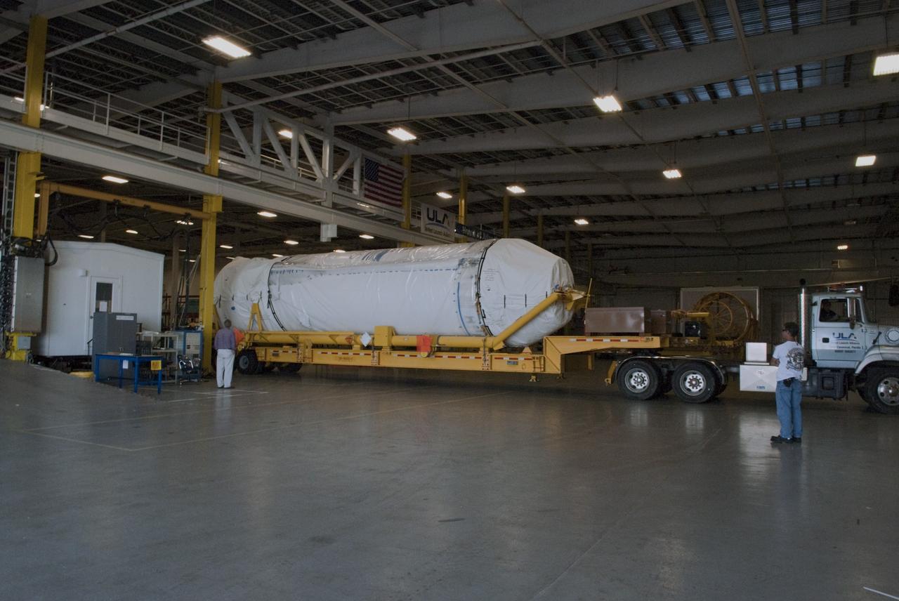 CAPE CANAVERAL, Fla. – A Centaur stage arrives the Atlas Spaceflight Operations Center, or ASOC, at Cape Canaveral Air Force Station to begin processing. The Centaur will be part of a launch vehicle that will boost the Tracking and Data Relay Satellite-K, or TDRS-K, into Earth orbit atop an Atlas V rocket. Lift off is scheduled for 11:57 p.m. on Dec. 13, 2012 from Space Launch Complex 41 at Cape Canaveral. The TDRS-K spacecraft is part of the next-generation series in the Tracking and Data Relay Satellite System, a constellation of space-based communication satellites providing tracking, telemetry, command and high-bandwidth data return services. For more information, visit http://tdrs.gsfc.nasa.gov/ Photo credit: NASA/Charisse Nahser