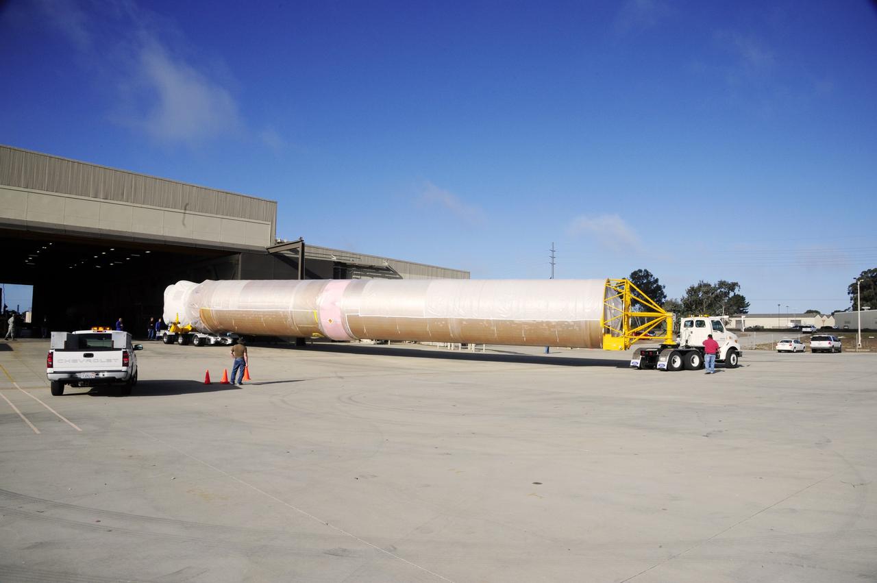 VANDENBERG AFB, Calif. – A truck moves the first stage booster of a United Launch Alliance Atlas V to Space Launch Complex-3E at Vandenberg Air Force Base, Calif. in preparation for the launch of the Landsat Data Continuity Mission. The Landsat Data Continuity Mission, or LDCM, is the future of Landsat satellites. It will continue to obtain valuable data and imagery to be used in agriculture, education, business, science, and government. The Landsat Program provides repetitive acquisition of high resolution multispectral data of the Earth's surface on a global basis. The data from the Landsat spacecraft constitute the longest record of the Earth's continental surfaces as seen from space. It is a record unmatched in quality, detail, coverage, and value. Launch is planned for Feb. 2013. Photo credit: NASA/Roy Allison