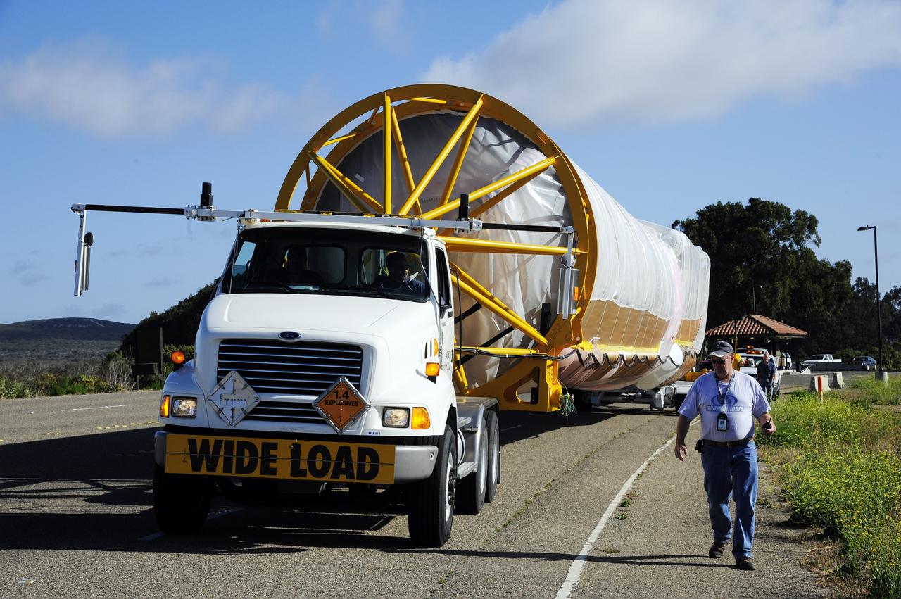 VANDENBERG AFB, Calif. – A truck moves the first stage booster of a United Launch Alliance Atlas V to Space Launch Complex-3E at Vandenberg Air Force Base, Calif. in preparation for the launch of the Landsat Data Continuity Mission.   The Landsat Data Continuity Mission, or LDCM, is the future of Landsat satellites. It will continue to obtain valuable data and imagery to be used in agriculture, education, business, science, and government. The Landsat Program provides repetitive acquisition of high resolution multispectral data of the Earth's surface on a global basis. The data from the Landsat spacecraft constitute the longest record of the Earth's continental surfaces as seen from space. It is a record unmatched in quality, detail, coverage, and value. Launch is planned for Feb. 2013. Photo credit: NASA/Roy Allison