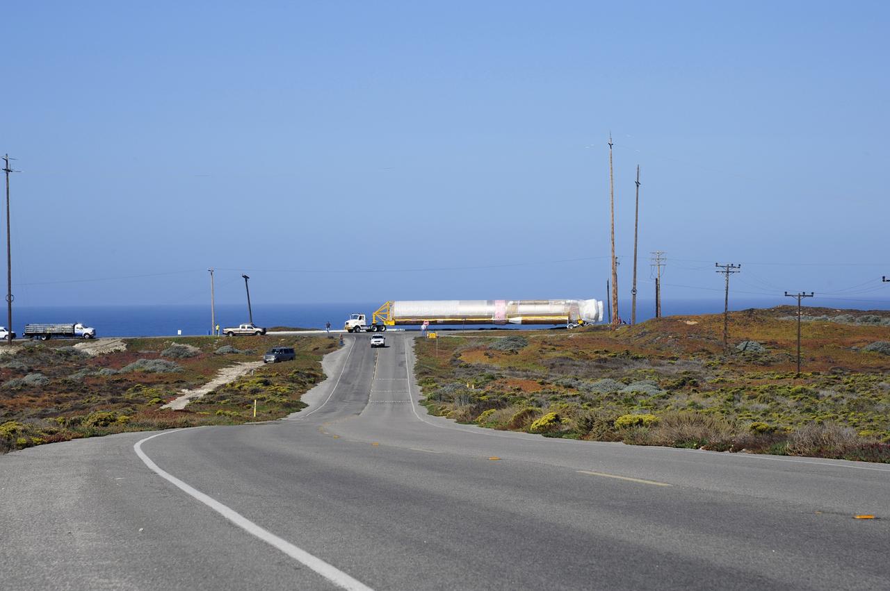 VANDENBERG AFB, Calif. – A truck moves the first stage booster of a United Launch Alliance Atlas V to Space Launch Complex-3E at Vandenberg Air Force Base, Calif. in preparation for the launch of the Landsat Data Continuity Mission.   The Landsat Data Continuity Mission, or LDCM, is the future of Landsat satellites. It will continue to obtain valuable data and imagery to be used in agriculture, education, business, science, and government. The Landsat Program provides repetitive acquisition of high resolution multispectral data of the Earth's surface on a global basis. The data from the Landsat spacecraft constitute the longest record of the Earth's continental surfaces as seen from space. It is a record unmatched in quality, detail, coverage, and value. Launch is planned for Feb. 2013. Photo credit: NASA/Roy Allison