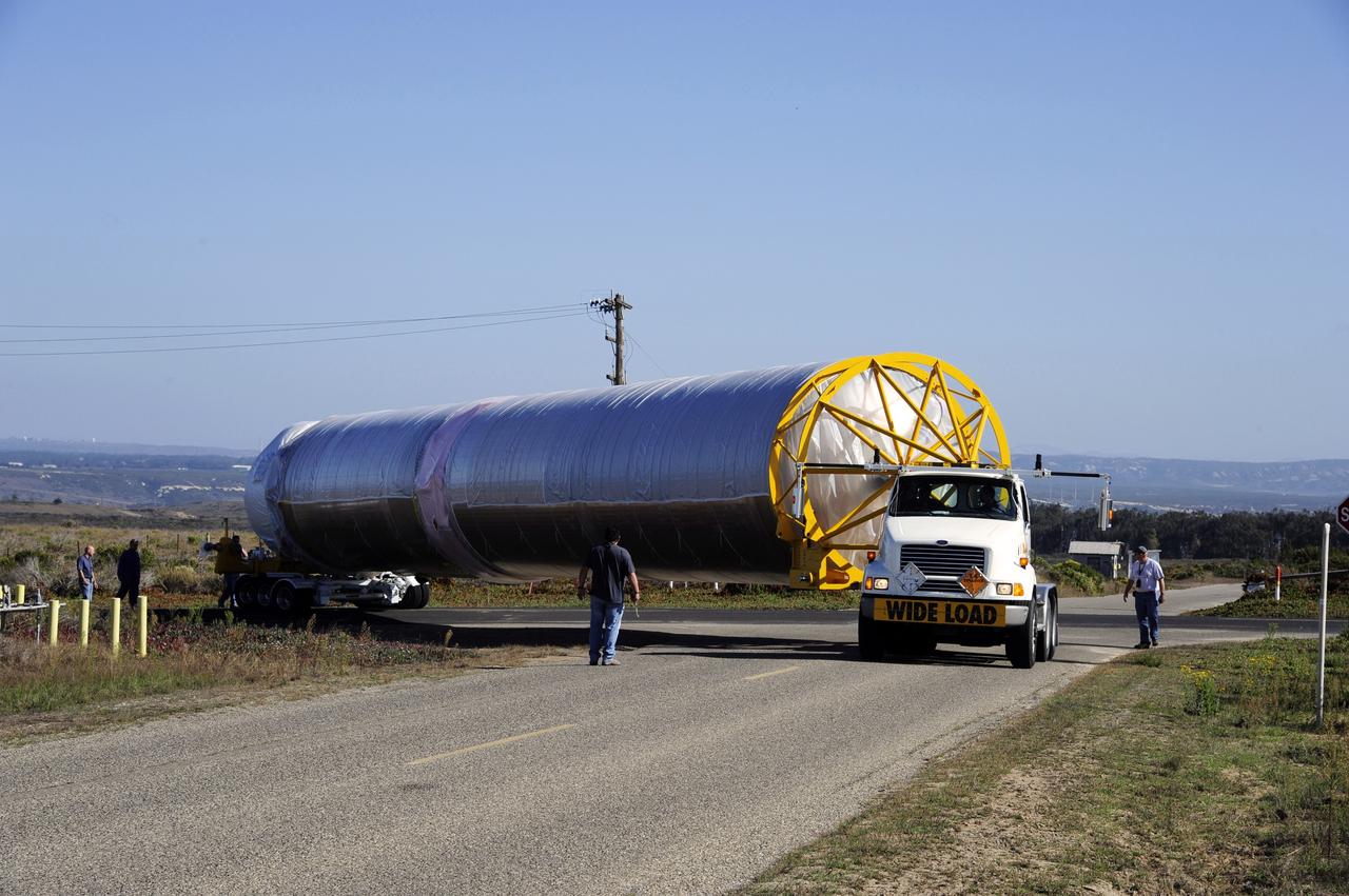 VANDENBERG AFB, Calif. – A truck moves the first stage booster of a United Launch Alliance Atlas V to Space Launch Complex-3E at Vandenberg Air Force Base, Calif. in preparation for the launch of the Landsat Data Continuity Mission.   The Landsat Data Continuity Mission, or LDCM, is the future of Landsat satellites. It will continue to obtain valuable data and imagery to be used in agriculture, education, business, science, and government. The Landsat Program provides repetitive acquisition of high resolution multispectral data of the Earth's surface on a global basis. The data from the Landsat spacecraft constitute the longest record of the Earth's continental surfaces as seen from space. It is a record unmatched in quality, detail, coverage, and value. Launch is planned for Feb. 2013. Photo credit: NASA/Roy Allison