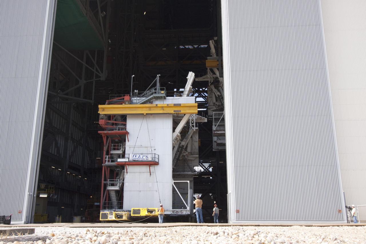 CAPE CANAVERAL, Fla. – As part of NASA's Ground Systems Development and Operations Program at the Kennedy Space Center in Florida, a large space shuttle-era work platform has been removed from high bay 3 of the Vehicle Assembly Building, or VAB. The work is part of a center-wide modernization and refurbishment initiative to accommodate NASA’s Space Launch System and a variety of other spacecraft instead of the whole building supporting one design. The Ground Systems Development and Operations Program is developing the necessary ground systems, infrastructure and operational approaches required to safely process, assemble, transport and launch the next generation of rockets and spacecraft in support of NASA’s exploration objectives. Future work also will replace the antiquated communications, power and vehicle access resources with modern efficient systems. Some of the utilities and systems slated for replacement have been used since the VAB opened in 1965. For more information, visit http://www.nasa.gov/exploration/systems/ground/index.html Photo credit: NASA/Jim Grossmann