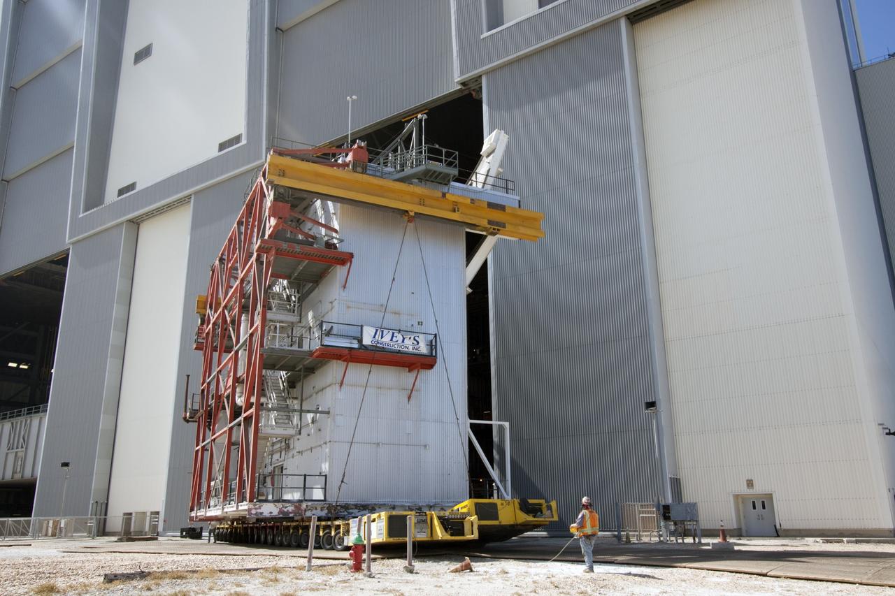 CAPE CANAVERAL, Fla. – As part of NASA's Ground Systems Development and Operations Program at the Kennedy Space Center in Florida, a large space shuttle-era work platform has been removed from high bay 3 of the Vehicle Assembly Building, or VAB. The work is part of a center-wide modernization and refurbishment initiative to accommodate NASA’s Space Launch System and a variety of other spacecraft instead of the whole building supporting one design. The Ground Systems Development and Operations Program is developing the necessary ground systems, infrastructure and operational approaches required to safely process, assemble, transport and launch the next generation of rockets and spacecraft in support of NASA’s exploration objectives. Future work also will replace the antiquated communications, power and vehicle access resources with modern efficient systems. Some of the utilities and systems slated for replacement have been used since the VAB opened in 1965. For more information, visit http://www.nasa.gov/exploration/systems/ground/index.html Photo credit: NASA/Jim Grossmann