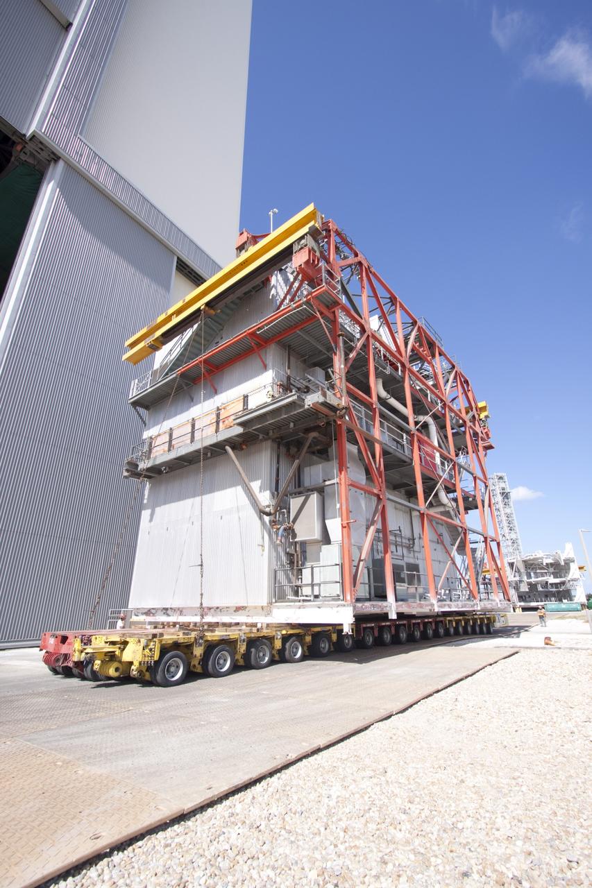 CAPE CANAVERAL, Fla. – As part of NASA's Ground Systems Development and Operations Program at the Kennedy Space Center in Florida, a large space shuttle-era work platform has been removed from high bay 3 of the Vehicle Assembly Building, or VAB. The work is part of a center-wide modernization and refurbishment initiative to accommodate NASA’s Space Launch System and a variety of other spacecraft instead of the whole building supporting one design. The Ground Systems Development and Operations Program is developing the necessary ground systems, infrastructure and operational approaches required to safely process, assemble, transport and launch the next generation of rockets and spacecraft in support of NASA’s exploration objectives. Future work also will replace the antiquated communications, power and vehicle access resources with modern efficient systems. Some of the utilities and systems slated for replacement have been used since the VAB opened in 1965. For more information, visit http://www.nasa.gov/exploration/systems/ground/index.html Photo credit: NASA/Jim Grossmann