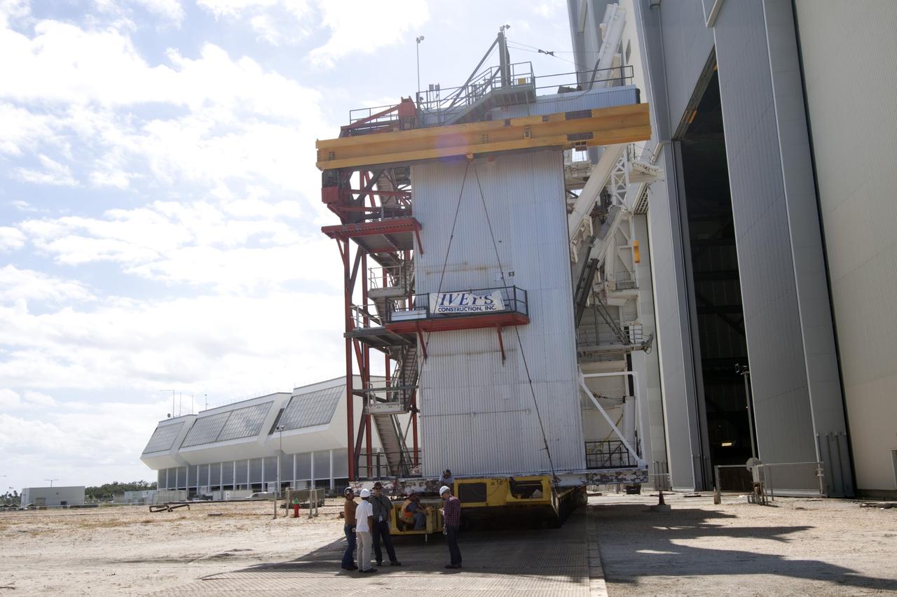 CAPE CANAVERAL, Fla. – As part of NASA's Ground Systems Development and Operations Program at the Kennedy Space Center in Florida, a large space shuttle-era work platform has been removed from high bay 3 of the Vehicle Assembly Building, or VAB. The work is part of a center-wide modernization and refurbishment initiative to accommodate NASA’s Space Launch System and a variety of other spacecraft instead of the whole building supporting one design. The Ground Systems Development and Operations Program is developing the necessary ground systems, infrastructure and operational approaches required to safely process, assemble, transport and launch the next generation of rockets and spacecraft in support of NASA’s exploration objectives. Future work also will replace the antiquated communications, power and vehicle access resources with modern efficient systems. Some of the utilities and systems slated for replacement have been used since the VAB opened in 1965. For more information, visit http://www.nasa.gov/exploration/systems/ground/index.html Photo credit: NASA/Jim Grossmann