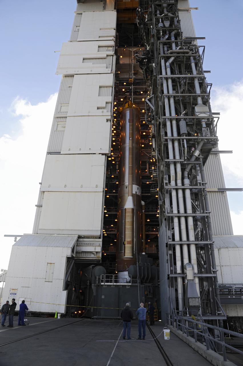 VANDENBERG AFB, Calif. – The first stage booster of a United Launch Alliance Atlas V is raised onto the launch pad at Space Launch Complex-3E at Vandenberg Air Force Base, Calif. in preparation for the launch of the Landsat Data Continuity Mission. The Landsat Data Continuity Mission LDCM is the future of Landsat satellites. It will continue to obtain valuable data and imagery to be used in agriculture, education, business, science, and government. The Landsat Program provides repetitive acquisition of high resolution multispectral data of the Earth's surface on a global basis. The data from the Landsat spacecraft constitute the longest record of the Earth's continental surfaces as seen from space. It is a record unmatched in quality, detail, coverage, and value. Launch is planned for Feb. 2013. Photo credit: NASA/Roy Allison