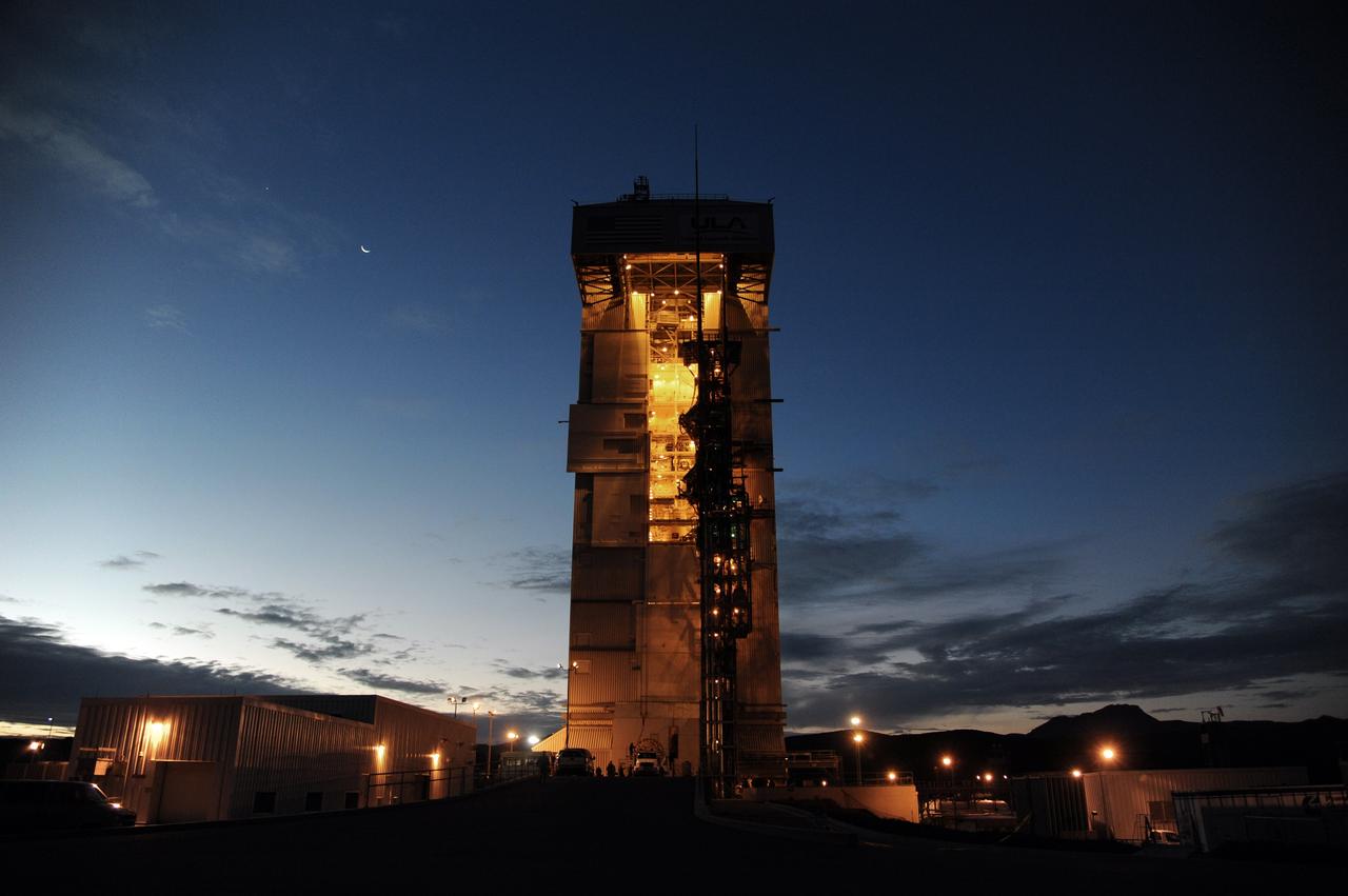 VANDENBERG AFB, Calif. – A Centaur upper stage is prepared for lifting onto the first stage booster of a United Launch Alliance Atlas V at the launch pad at Space Launch Complex-3E at Vandenberg Air Force Base, Calif. in preparation for the launch of the Landsat Data Continuation Mission.   The Landsat Data Continuity Mission LDCM is the future of Landsat satellites. It will continue to obtain valuable data and imagery to be used in agriculture, education, business, science, and government. The Landsat Program provides repetitive acquisition of high resolution multispectral data of the Earth's surface on a global basis. The data from the Landsat spacecraft constitute the longest record of the Earth's continental surfaces as seen from space. It is a record unmatched in quality, detail, coverage, and value. Launch is planned for Feb. 2013. Photo credit: NASA/Roy Allison