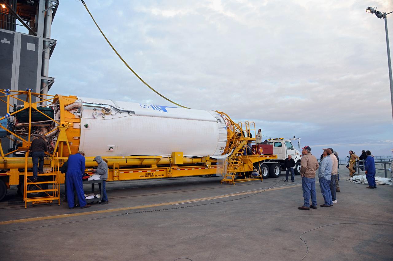 VANDENBERG AFB, Calif. – A Centaur upper stage is prepared for lifting onto the first stage booster of a United Launch Alliance Atlas V at the launch pad at Space Launch Complex-3E at Vandenberg Air Force Base, Calif. in preparation for the launch of the Landsat Data Continuation Mission.   The Landsat Data Continuity Mission LDCM is the future of Landsat satellites. It will continue to obtain valuable data and imagery to be used in agriculture, education, business, science, and government. The Landsat Program provides repetitive acquisition of high resolution multispectral data of the Earth's surface on a global basis. The data from the Landsat spacecraft constitute the longest record of the Earth's continental surfaces as seen from space. It is a record unmatched in quality, detail, coverage, and value. Launch is planned for Feb. 2013. Photo credit: NASA/Roy Allison