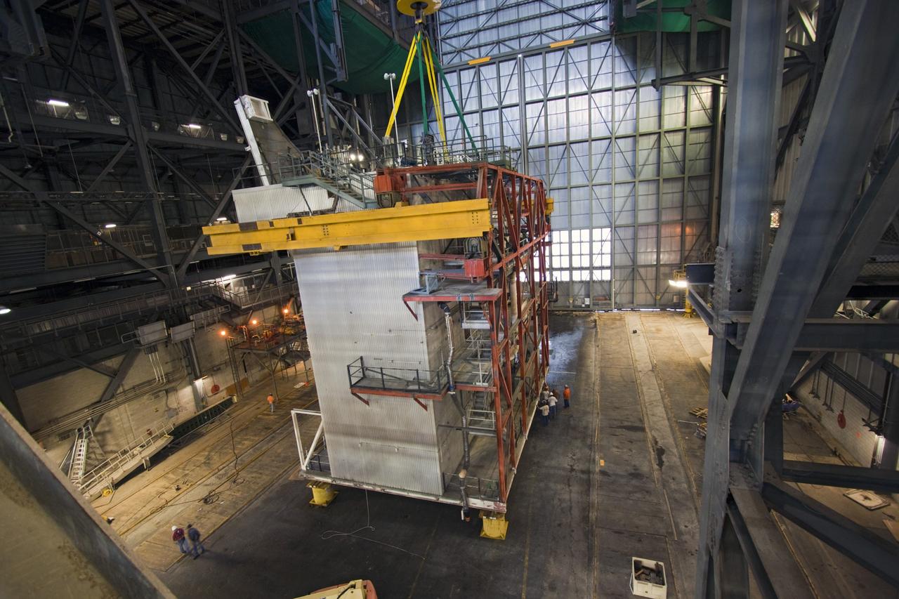 CAPE CANAVERAL, Fla. – As part of NASA's Ground Systems Development and Operations Program at the Kennedy Space Center in Florida, a large space shuttle-era work platform is being removed from high bay 3 of the Vehicle Assembly Building, or VAB. The work is part of a center-wide modernization and refurbishment initiative to accommodate NASA’s Space Launch System and a variety of other spacecraft instead of the whole building supporting one design. The Ground Systems Development and Operations Program is developing the necessary ground systems, infrastructure and operational approaches required to safely process, assemble, transport and launch the next generation of rockets and spacecraft in support of NASA’s exploration objectives. Future work also will replace the antiquated communications, power and vehicle access resources with modern efficient systems. Some of the utilities and systems slated for replacement have been used since the VAB opened in 1965. For more information, visit http://www.nasa.gov/exploration/systems/ground/index.html Photo credit: NASA/Jim Grossmann