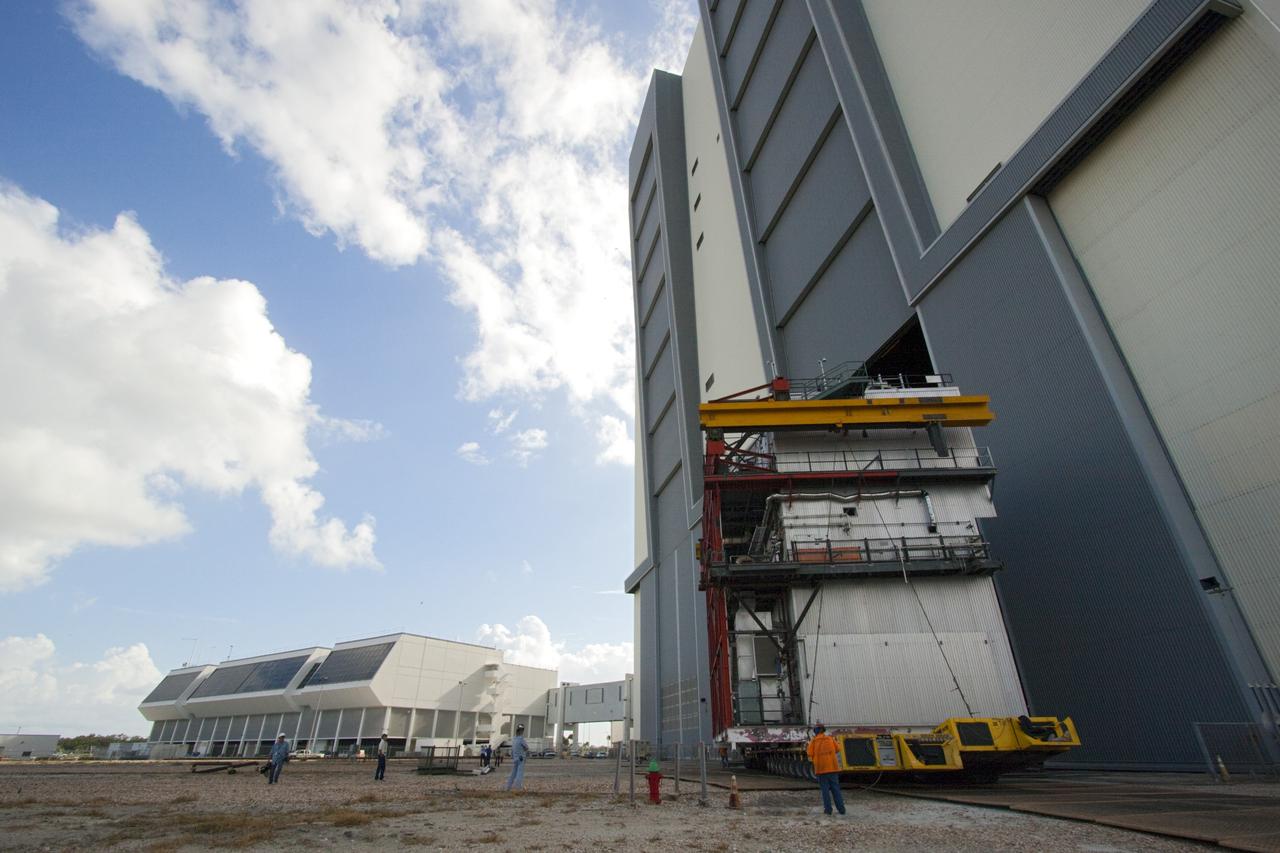 CAPE CANAVERAL, Fla. – As part of NASA's Ground Systems Development and Operations Program at the Kennedy Space Center in Florida, a large space shuttle-era work platform has been removed from high bay 3 of the Vehicle Assembly Building, or VAB. The work is part of a center-wide modernization and refurbishment initiative to accommodate NASA’s Space Launch System and a variety of other spacecraft instead of the whole building supporting one design. The Ground Systems Development and Operations Program is developing the necessary ground systems, infrastructure and operational approaches required to safely process, assemble, transport and launch the next generation of rockets and spacecraft in support of NASA’s exploration objectives. Future work also will replace the antiquated communications, power and vehicle access resources with modern efficient systems. Some of the utilities and systems slated for replacement have been used since the VAB opened in 1965. For more information, visit http://www.nasa.gov/exploration/systems/ground/index.html Photo credit: NASA/Jim Grossmann
