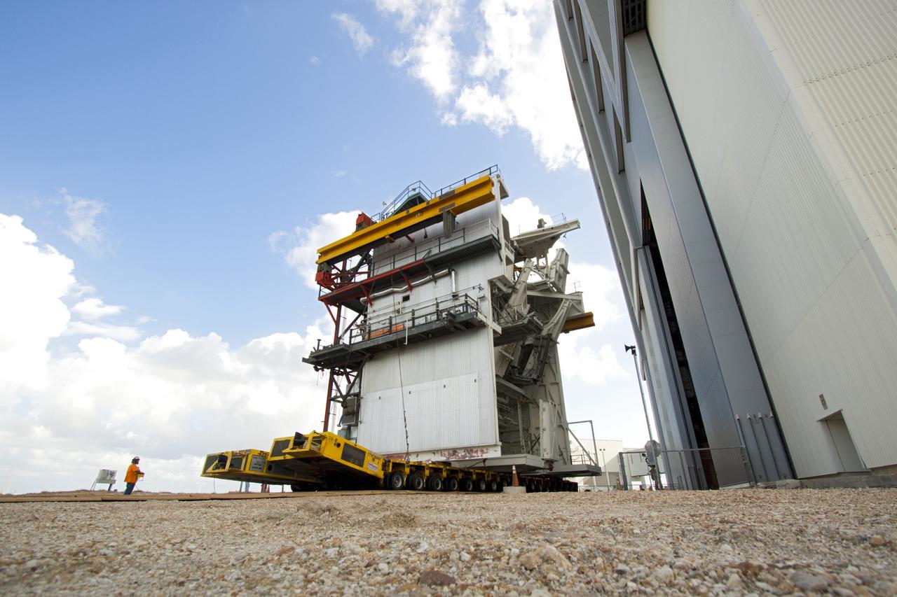 CAPE CANAVERAL, Fla. – As part of NASA's Ground Systems Development and Operations Program at the Kennedy Space Center in Florida, a large space shuttle-era work platform has been removed from high bay 3 of the Vehicle Assembly Building, or VAB. The work is part of a center-wide modernization and refurbishment initiative to accommodate NASA’s Space Launch System and a variety of other spacecraft instead of the whole building supporting one design. The Ground Systems Development and Operations Program is developing the necessary ground systems, infrastructure and operational approaches required to safely process, assemble, transport and launch the next generation of rockets and spacecraft in support of NASA’s exploration objectives. Future work also will replace the antiquated communications, power and vehicle access resources with modern efficient systems. Some of the utilities and systems slated for replacement have been used since the VAB opened in 1965. For more information, visit http://www.nasa.gov/exploration/systems/ground/index.html Photo credit: NASA/Jim Grossmann
