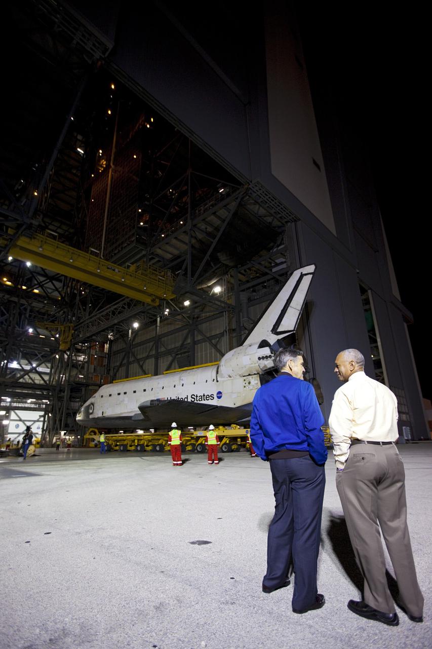 CAPE CANAVERAL, Fla. – Kennedy Space Center Director Bob Cabana, left, talks with NASA Administrator Charles Bolden as the space shuttle Atlantis backs out of the Vehicle Assembly Building at NASA's Kennedy Space Center in Florida for its 10-mile trip to the Kennedy Visitor Complex where it will be put on public display. As part of transition and retirement of the Space Shuttle Program, Atlantis is to be displayed at Kennedy's Visitor Complex beginning in the summer of 2013. Over the course of its 26-year career, Atlantis traveled 125,935,769 miles during 307 days in space over 33 missions. For more information, visit http://www.nasa.gov/transition Photo credit: NASA/ Kim Shiflett
