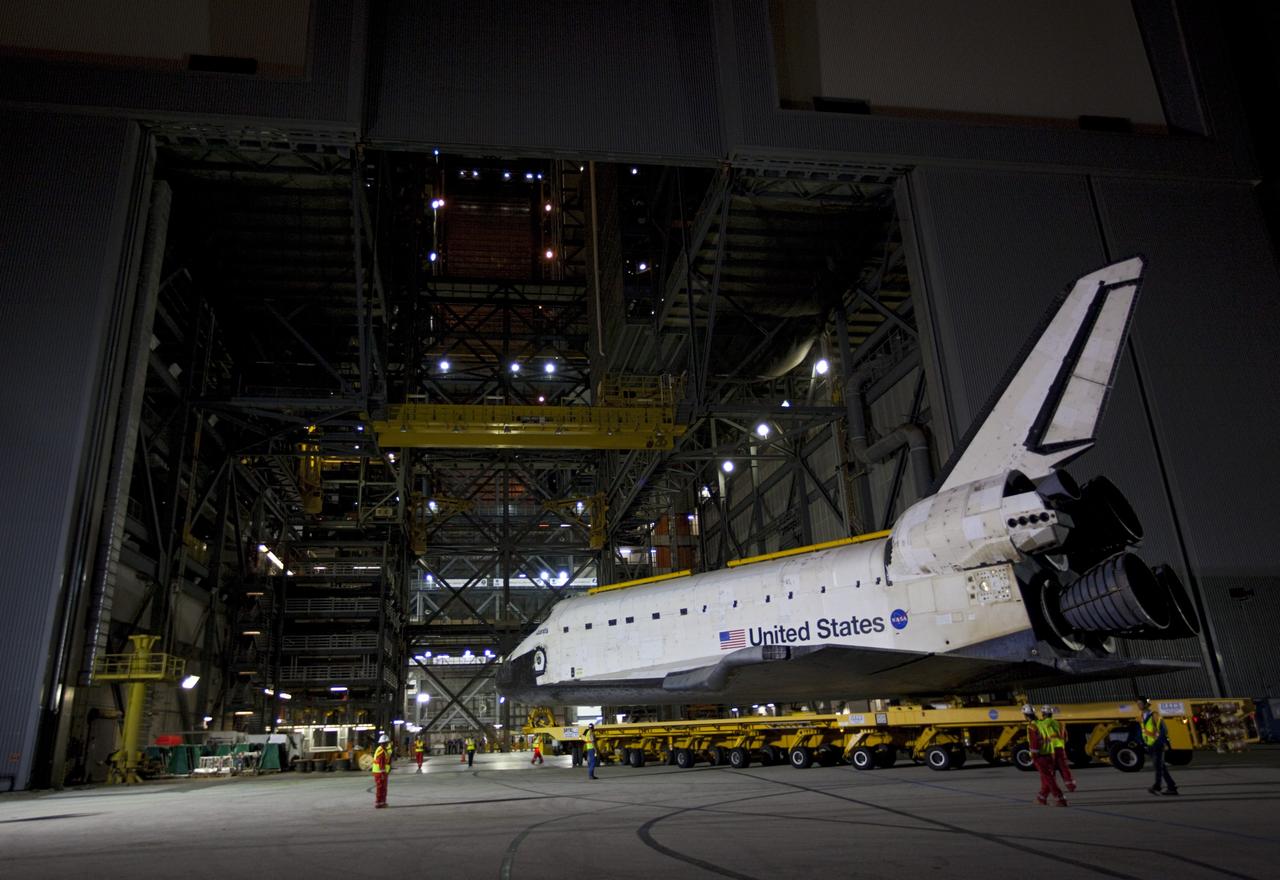 CAPE CANAVERAL, Fla. – Space shuttle Atlantis backs out of the Vehicle Assembly Building at NASA's Kennedy Space Center in Florida for its 10-mile trip to the Kennedy Visitor Complex where it will be put on public display. As part of transition and retirement of the Space Shuttle Program, Atlantis is to be displayed at Kennedy's Visitor Complex beginning in the summer of 2013. Over the course of its 26-year career, Atlantis traveled 125,935,769 miles during 307 days in space over 33 missions. For more information, visit http://www.nasa.gov/transition Photo credit: NASA/ Kim Shiflett