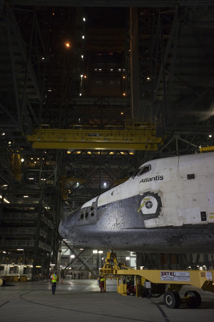 CAPE CANAVERAL, Fla. – Space shuttle Atlantis backs out of the Vehicle Assembly Building at NASA's Kennedy Space Center in Florida for its 10-mile trip to the Kennedy Visitor Complex where it will be put on public display. As part of transition and retirement of the Space Shuttle Program, Atlantis is to be displayed at Kennedy's Visitor Complex beginning in the summer of 2013. Over the course of its 26-year career, Atlantis traveled 125,935,769 miles during 307 days in space over 33 missions. For more information, visit http://www.nasa.gov/transition Photo credit: NASA/ Kim Shiflett