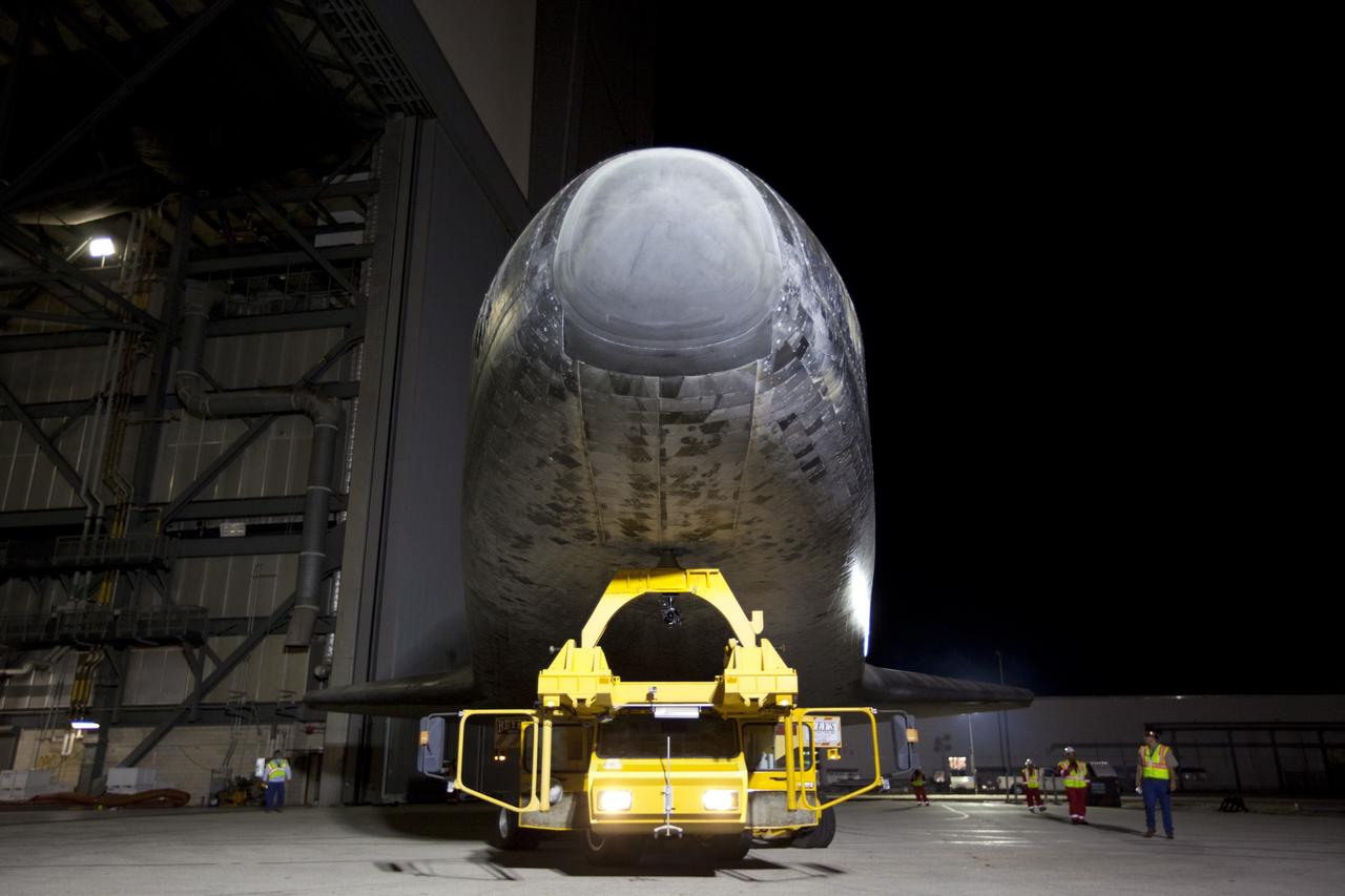 CAPE CANAVERAL, Fla. – Space shuttle Atlantis moves out of the Vehicle Assembly Building at NASA's Kennedy Space Center in Florida for its 10-mile trip to the Kennedy Visitor Complex where it will be put on public display. As part of transition and retirement of the Space Shuttle Program, Atlantis is to be displayed at Kennedy's Visitor Complex beginning in the summer of 2013. Over the course of its 26-year career, Atlantis traveled 125,935,769 miles during 307 days in space over 33 missions. For more information, visit http://www.nasa.gov/transition Photo credit: NASA/ Kim Shiflett