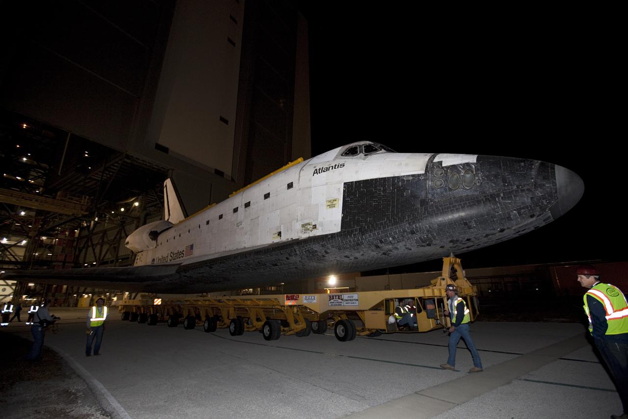 CAPE CANAVERAL, Fla. – Space shuttle Atlantis moves out of the Vehicle Assembly Building at NASA's Kennedy Space Center in Florida for its 10-mile trip to the Kennedy Visitor Complex where it will be put on public display. As part of transition and retirement of the Space Shuttle Program, Atlantis is to be displayed at Kennedy's Visitor Complex beginning in the summer of 2013. Over the course of its 26-year career, Atlantis traveled 125,935,769 miles during 307 days in space over 33 missions. For more information, visit http://www.nasa.gov/transition Photo credit: NASA/ Kim Shiflett