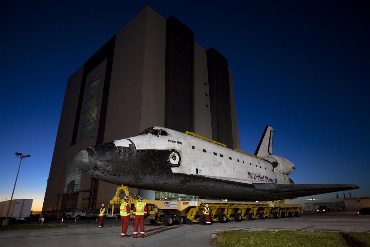 CAPE CANAVERAL, Fla. – Space shuttle Atlantis moves out of the Vehicle Assembly Building at NASA's Kennedy Space Center in Florida for its 10-mile trip to the Kennedy Visitor Complex where it will be put on public display. As part of transition and retirement of the Space Shuttle Program, Atlantis is to be displayed at Kennedy's Visitor Complex beginning in the summer of 2013. Over the course of its 26-year career, Atlantis traveled 125,935,769 miles during 307 days in space over 33 missions. For more information, visit http://www.nasa.gov/transition Photo credit: NASA/ Kim Shiflett